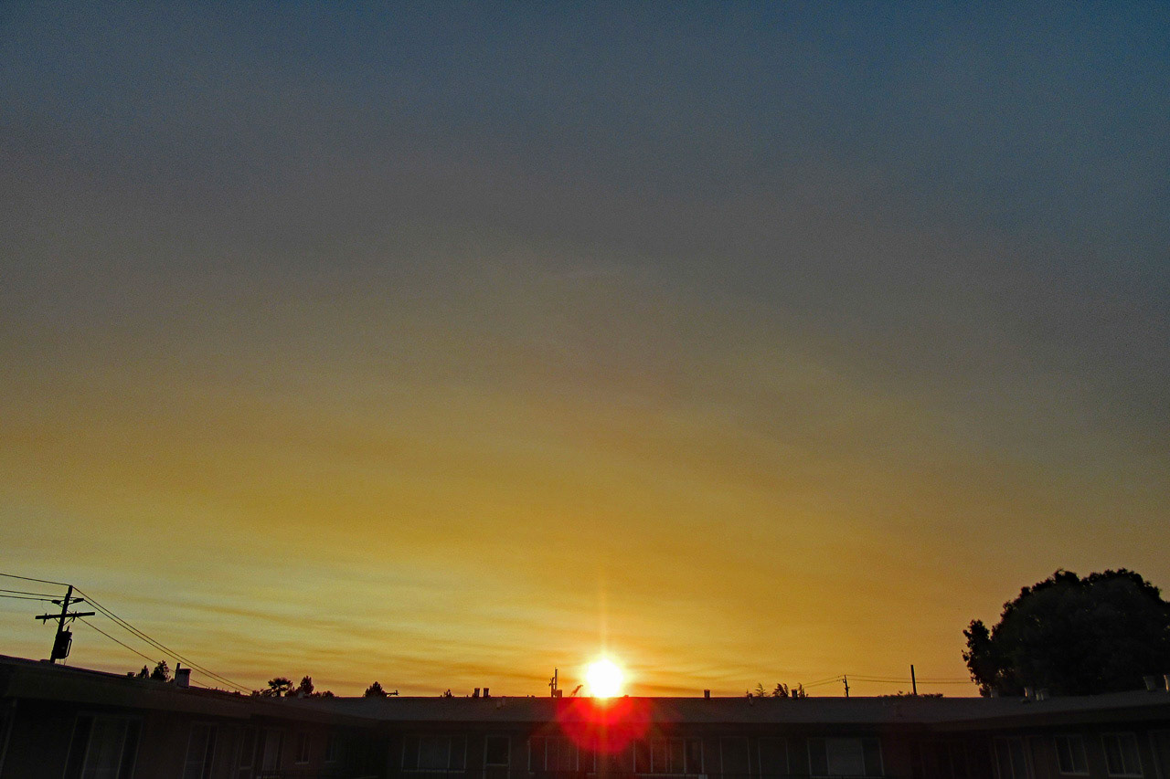 Sunset In Smoke-Filled Sky