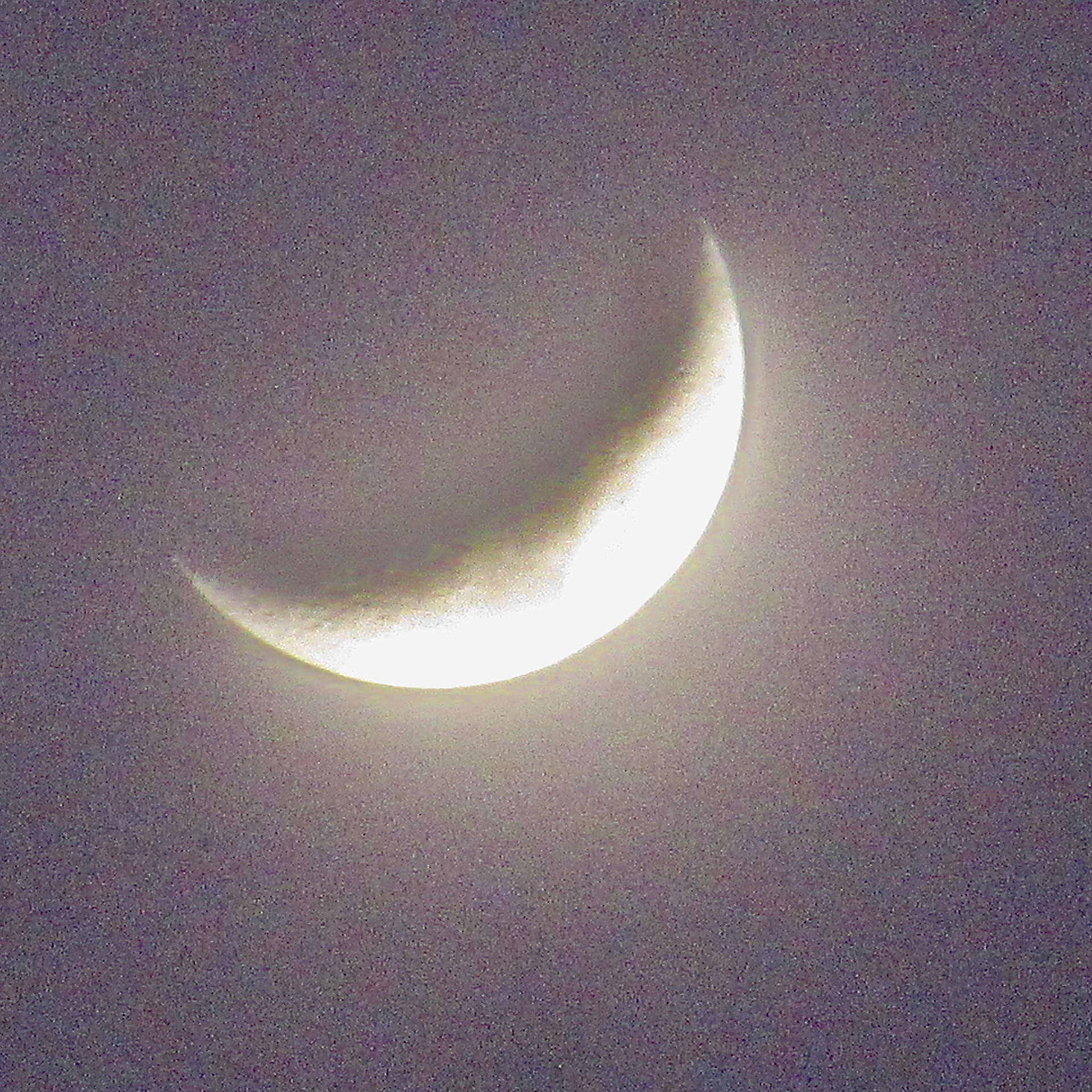 Misty Waxing Crescent Moon