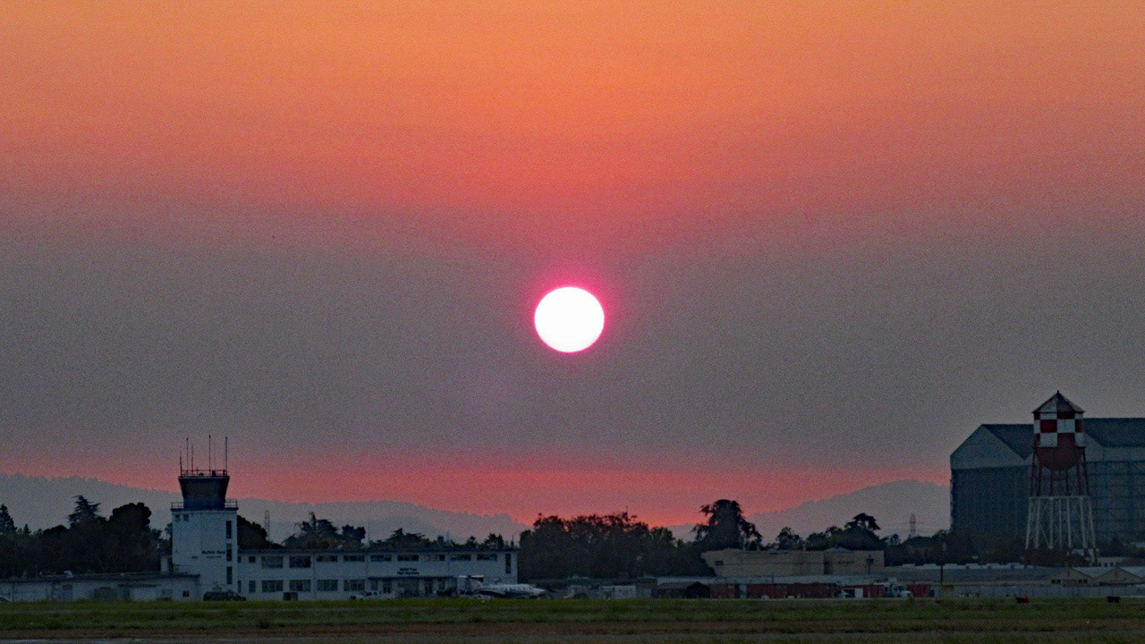 Sunset In Smoke-Filled Sky
