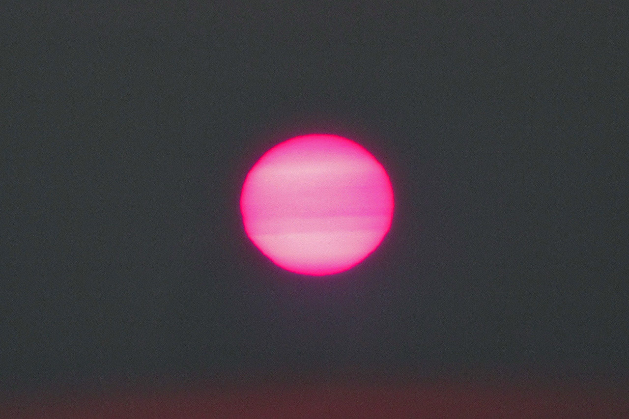 Sunset In Smoke-Filled Sky