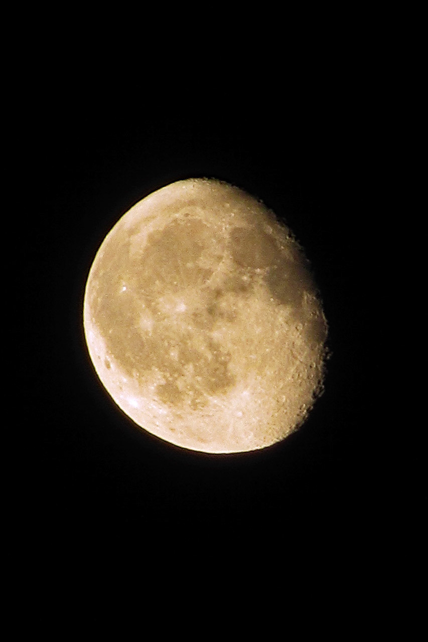 Waning Gibbous Moon In An Overcast Sky