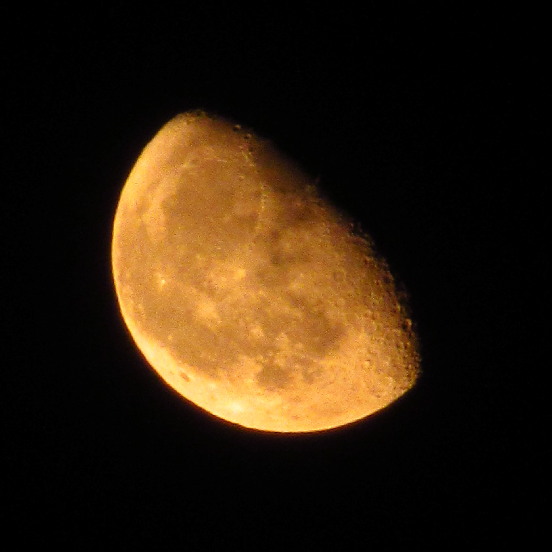 Waning Gibbous Moon Rasing In Smoke-Filled Sky