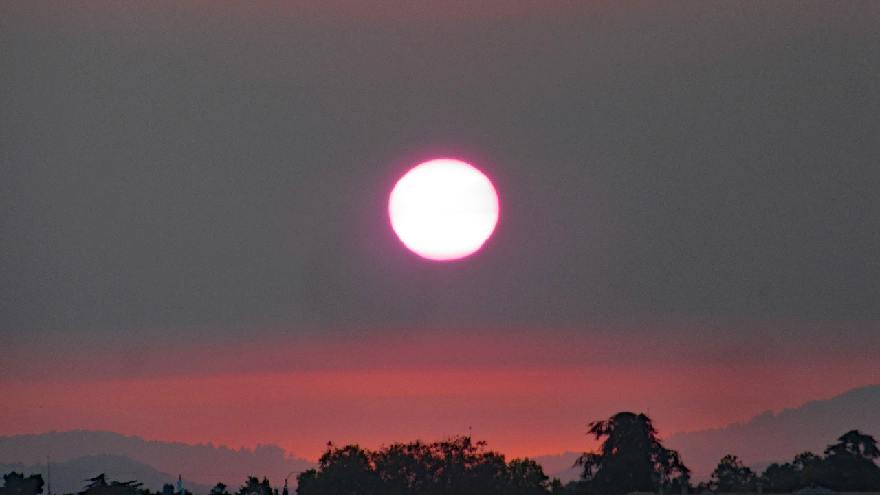 Sunset In Smoke-Filled Sky