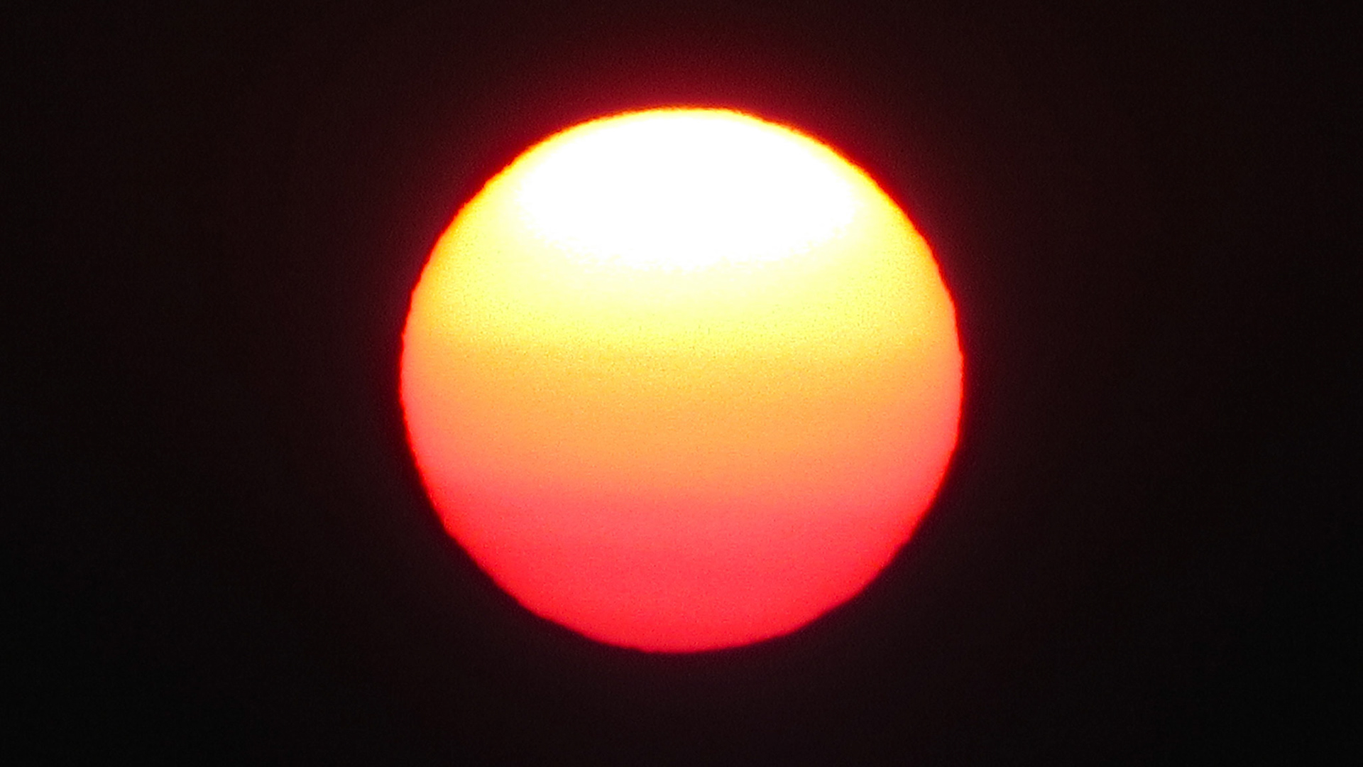 Sunset In Smoke-Filled Sky