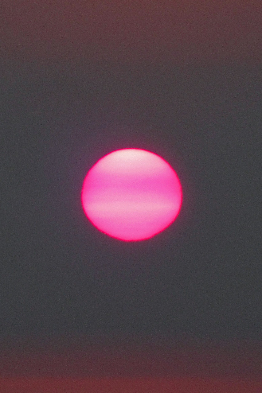 Sunset In Smoke-Filled Sky