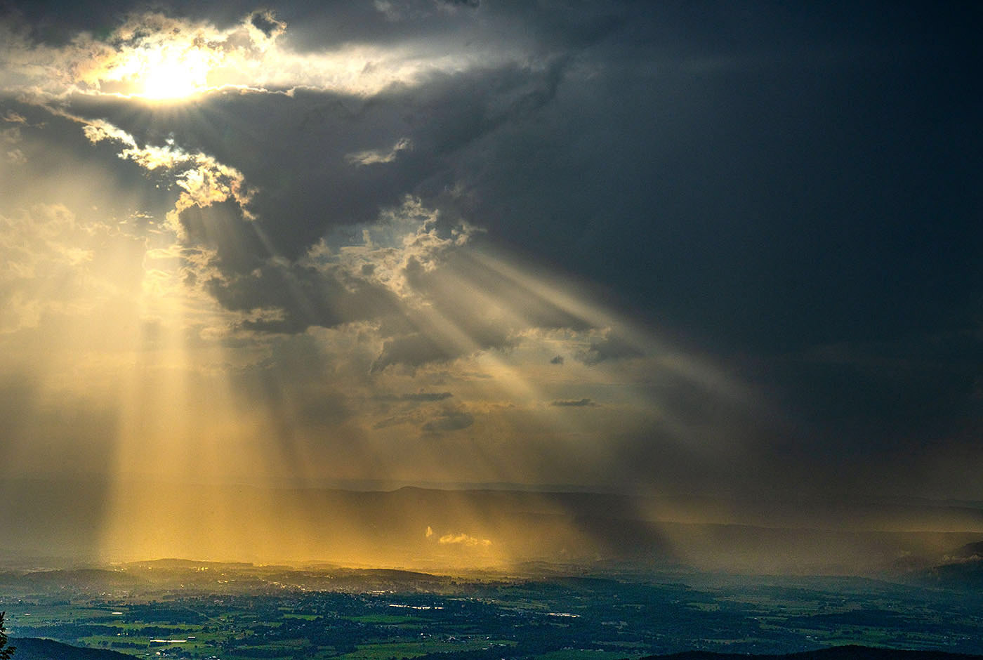 The sun breaks through the clouds after a rainstorm over the Shenandoah Valley. (Luray, VA))