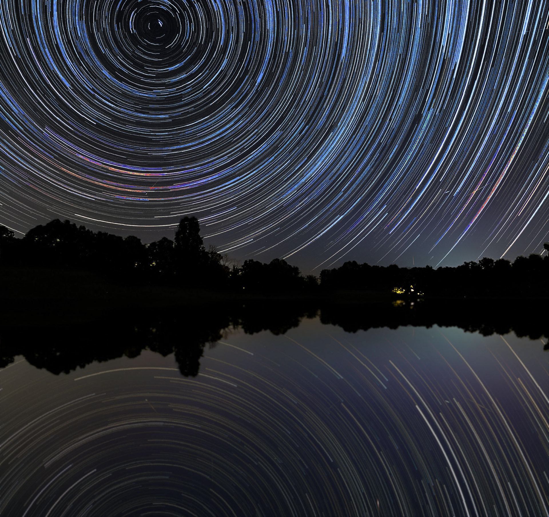 Meteors from the Perseids Meteor Shower and star trails in the night sky. (Murphysboro, IL)