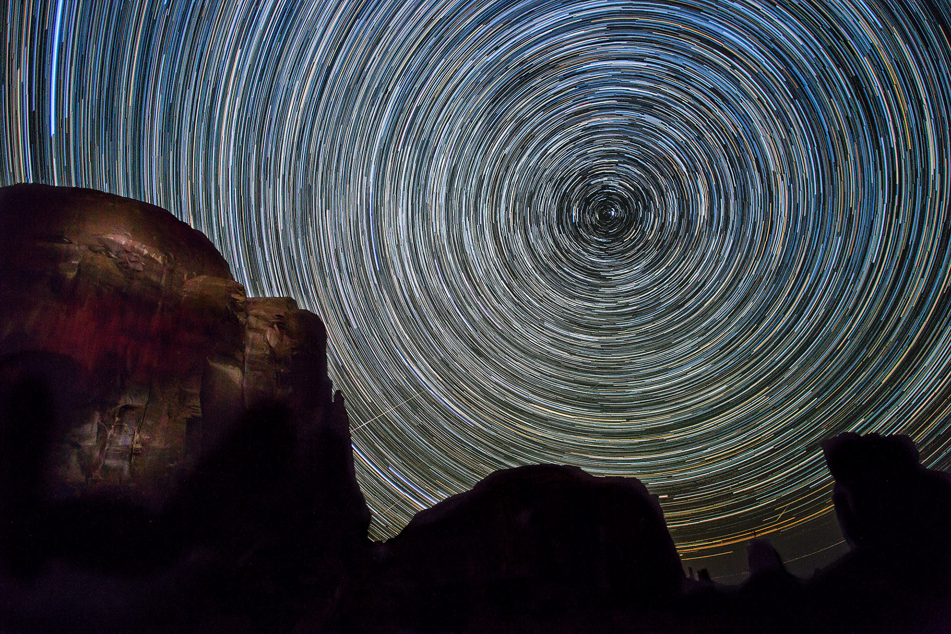 Perseid meteor shower with star trails time exposure. (Monument Valley, AZ)