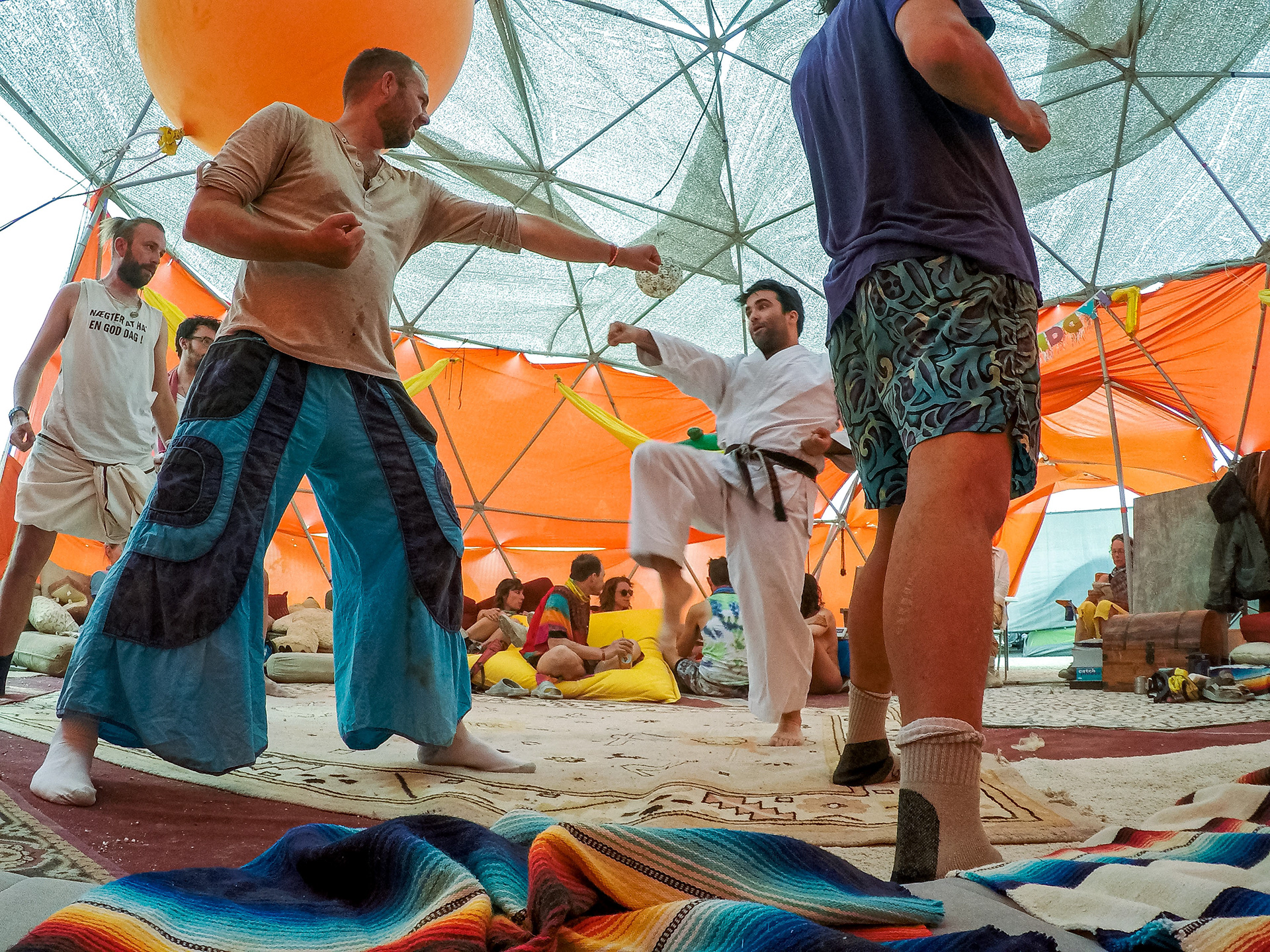 Camps offer just about anything imaginable: food, drink, music, movies, art, comedy, rides, experiences of every conceivable type, classes (like karate shown here) and much more. And there is no cost. Nothing is bartered, traded or bought, with only two exceptions.