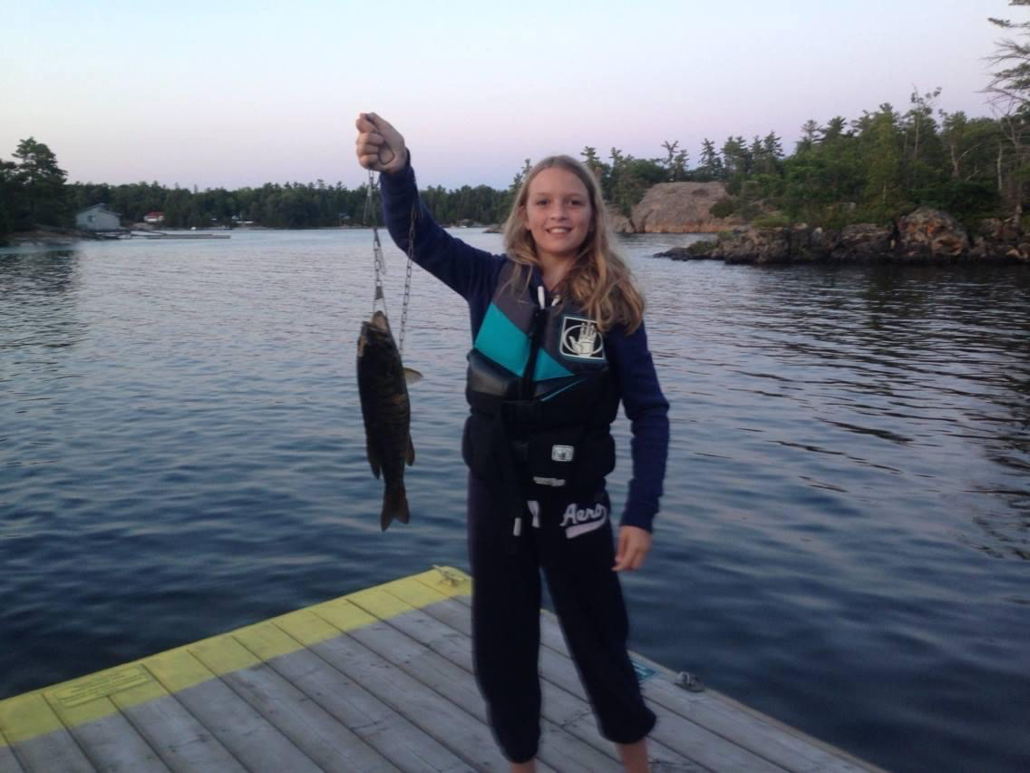Allyssa and one of her first "big catches" on Georgian Bay