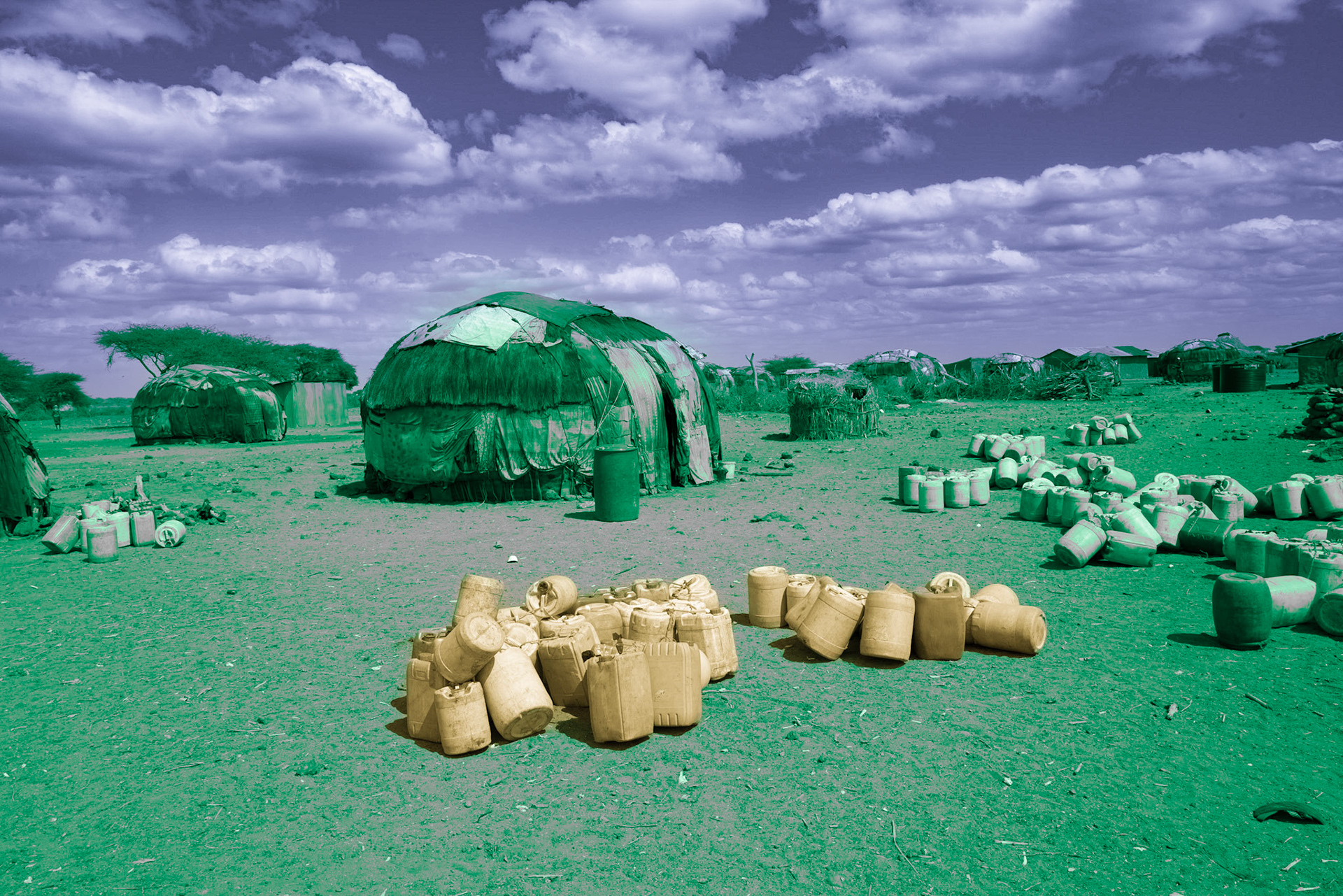 There are numerous empty jerrycans scattered outside a traditional Gabra hut in the village of Forolle, near the Kenya-Ethiopia border. In 2019, 11 people were killed in the area over a dispute on a watering point. Local conflicts, including arms trafficking and cattle rustling, are common in Marsabit county in Kenya.