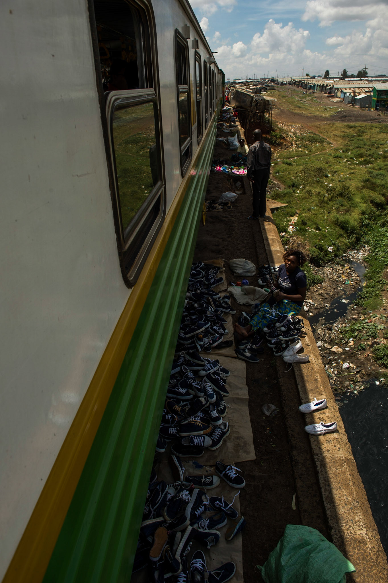 trian passing by slum