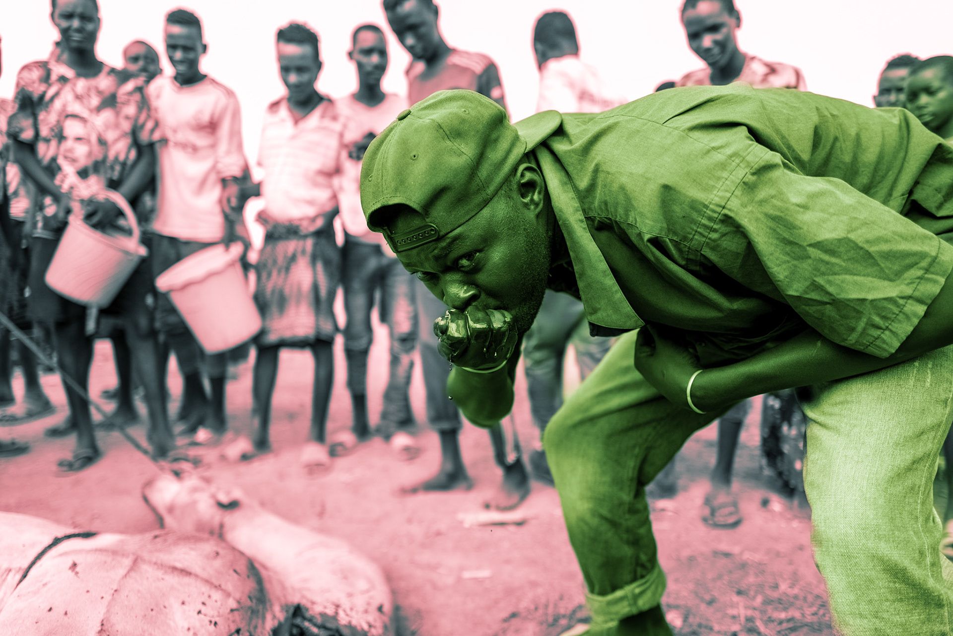 A Daasanach man in Selicho is drinking blood from a slaughtered camel. In the traditional diet of pastoralist communities, blood is a valuable source of nutrients and is typically consumed whenever an animal is slaughtered.