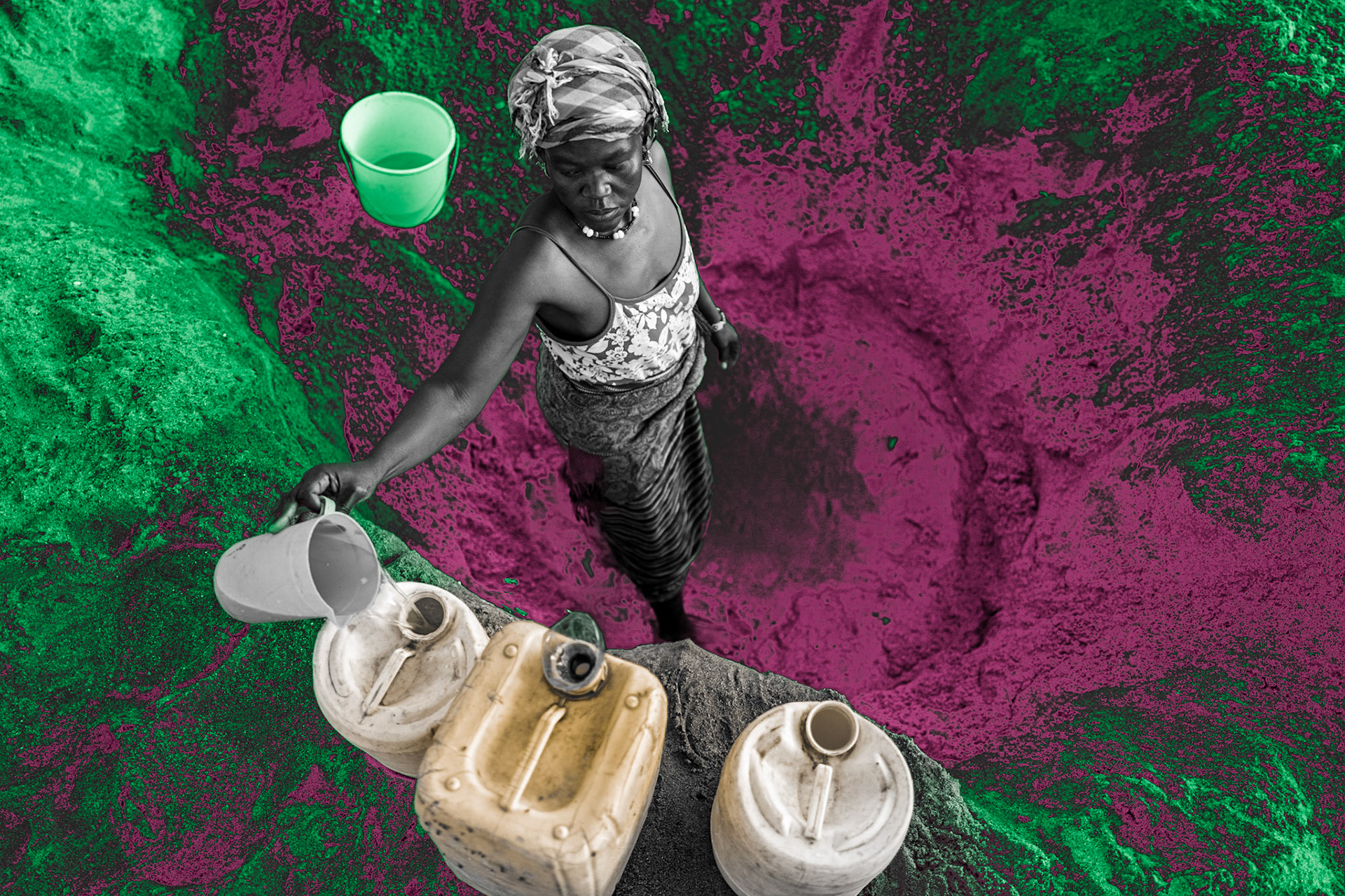 A Turkana woman draws water from a dry riverbed in Tarach. Unlike the refugees in the camp, many indigenous communities do not have access to clean water provided by the international community.