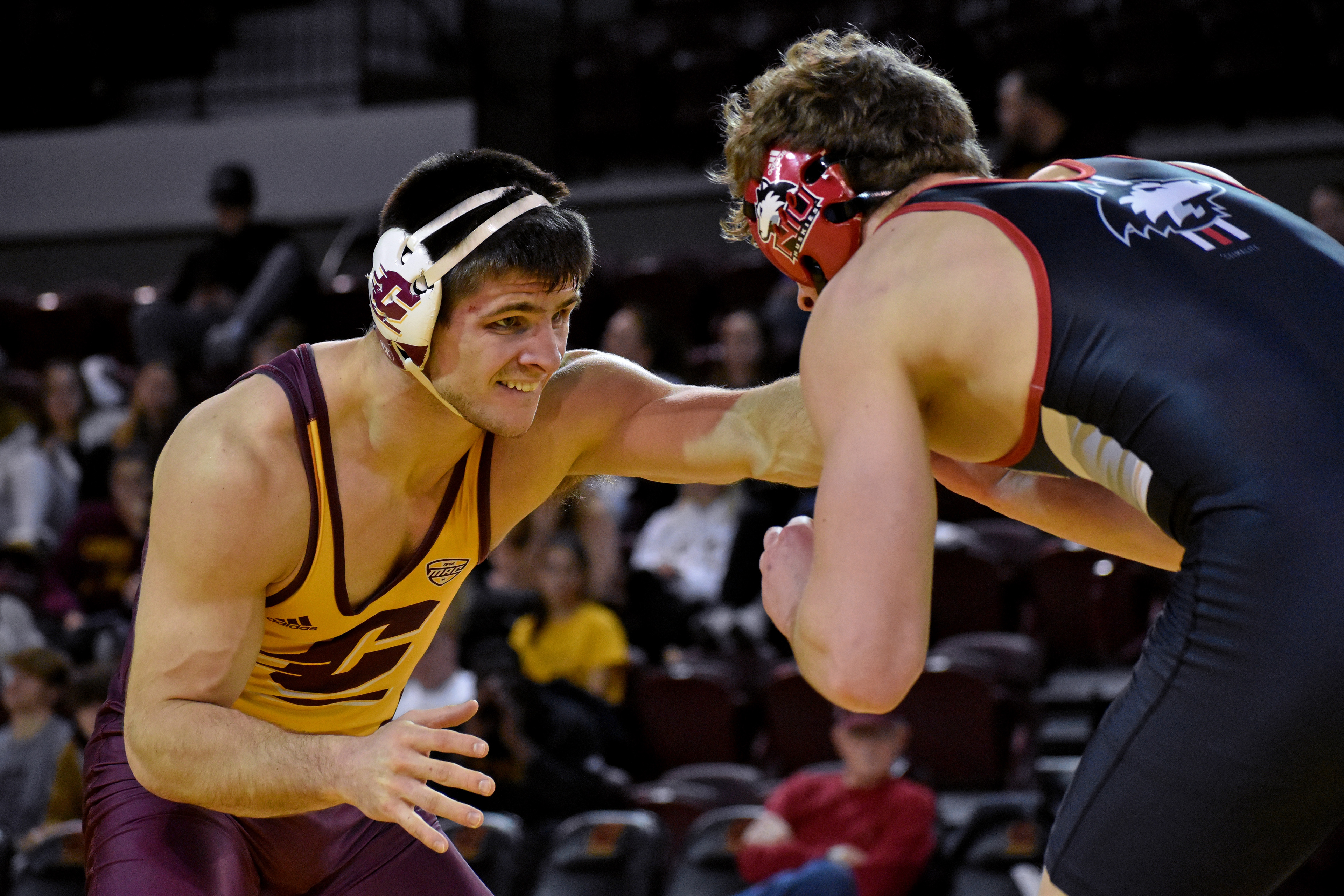 Flushing redshirt senior Ben Cushman wrestles during a match against Northern Illinois University Friday, Jan. 13 in McGuirk Arena. Cushman was 8-12 going into the match.