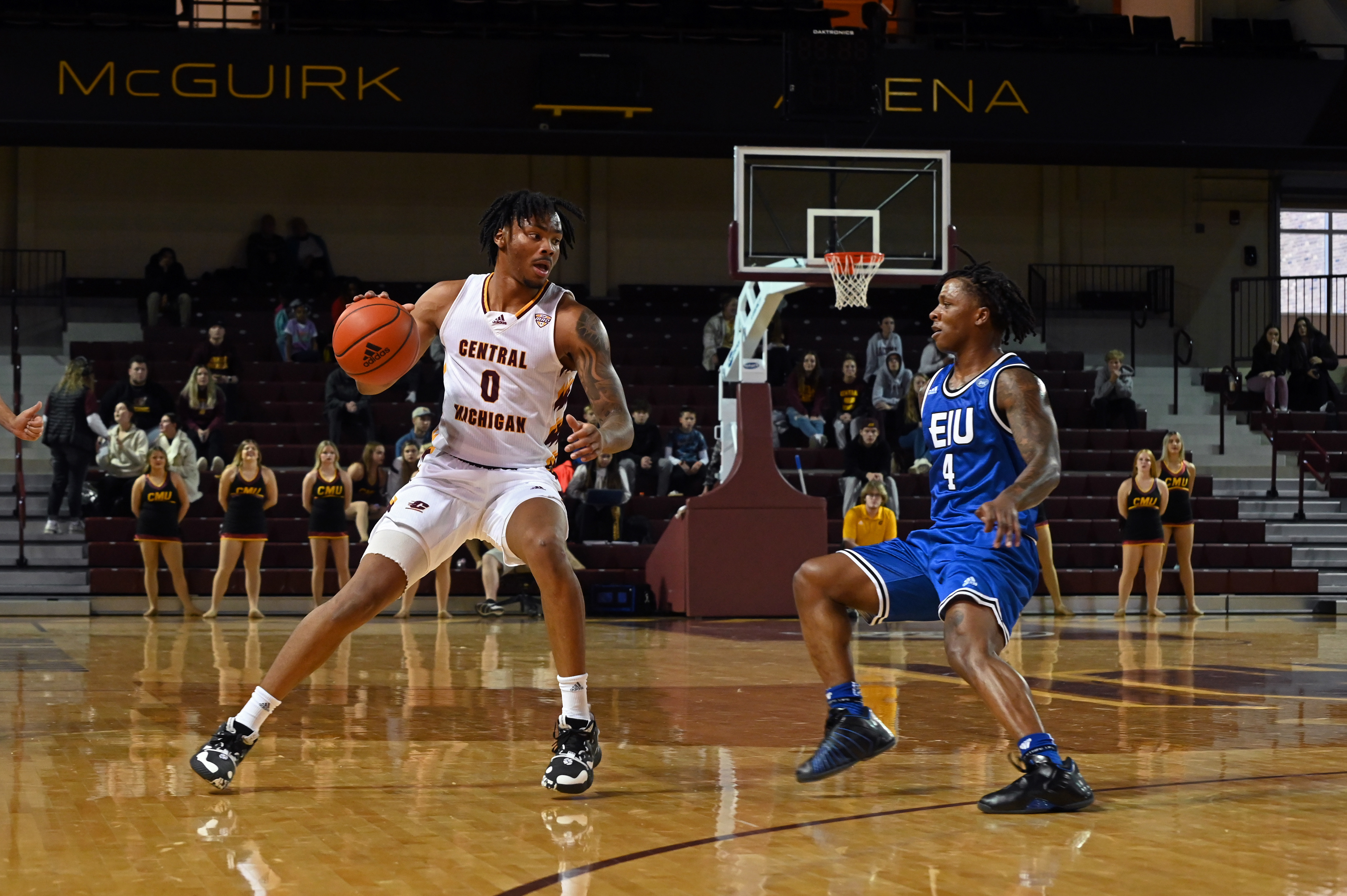 Senior guard Brian Taylor dribbles the ball during a game against Eastern Illinois Sunday, Nov. 13 in McGuirk Arena.