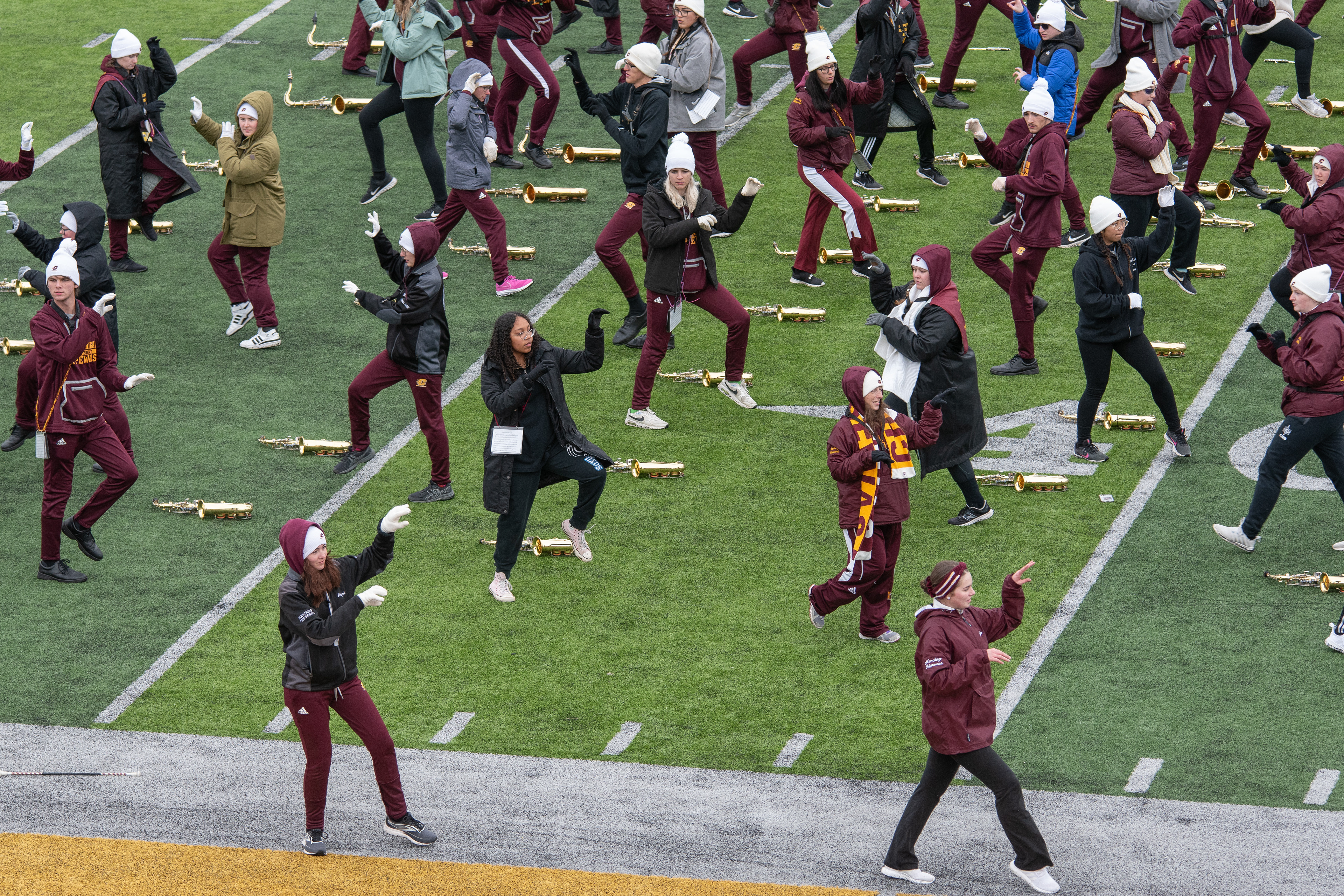Gaia dances to “Thriller” with the Chippewa Marching band during its halftime show rehearsal at Kramer/Deromedi Field in Kelly/Shorts Stadium, on the campus of Central Michigan University, Mount Pleasant, Michigan, Tuesday, October 31, 2023. For this halftime performance, the band planned to dance facing the student section. “Some of my favorite moments ever are when we do things facing the student section,” Gaia said. “It’s such an awesome feeling.”