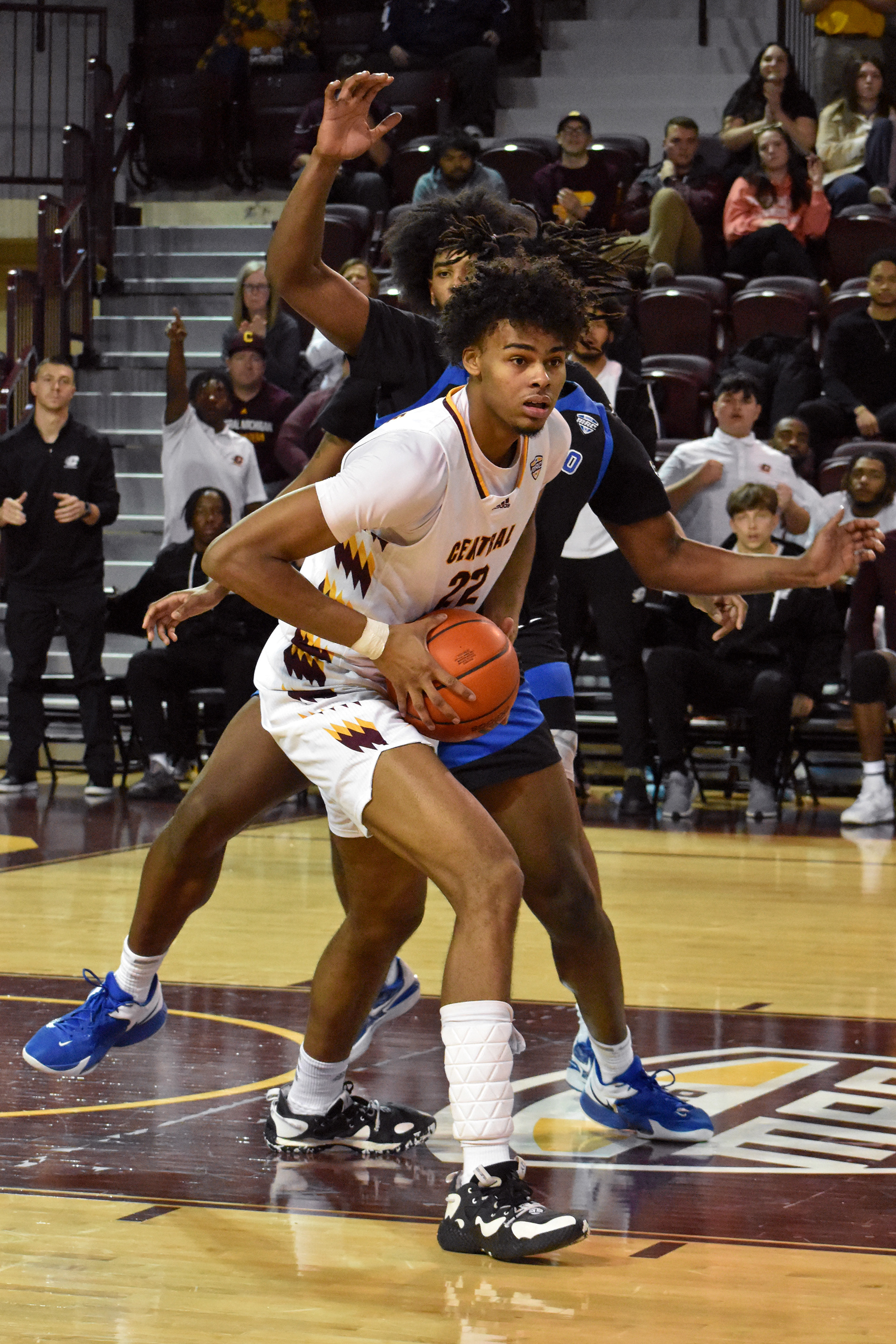 Sophomore center Nicolas Pavrette looks to pass the ball during a game against Buffalo Saturday, Jan. 14 in McGuirk Arena. Pavrette scored six points.