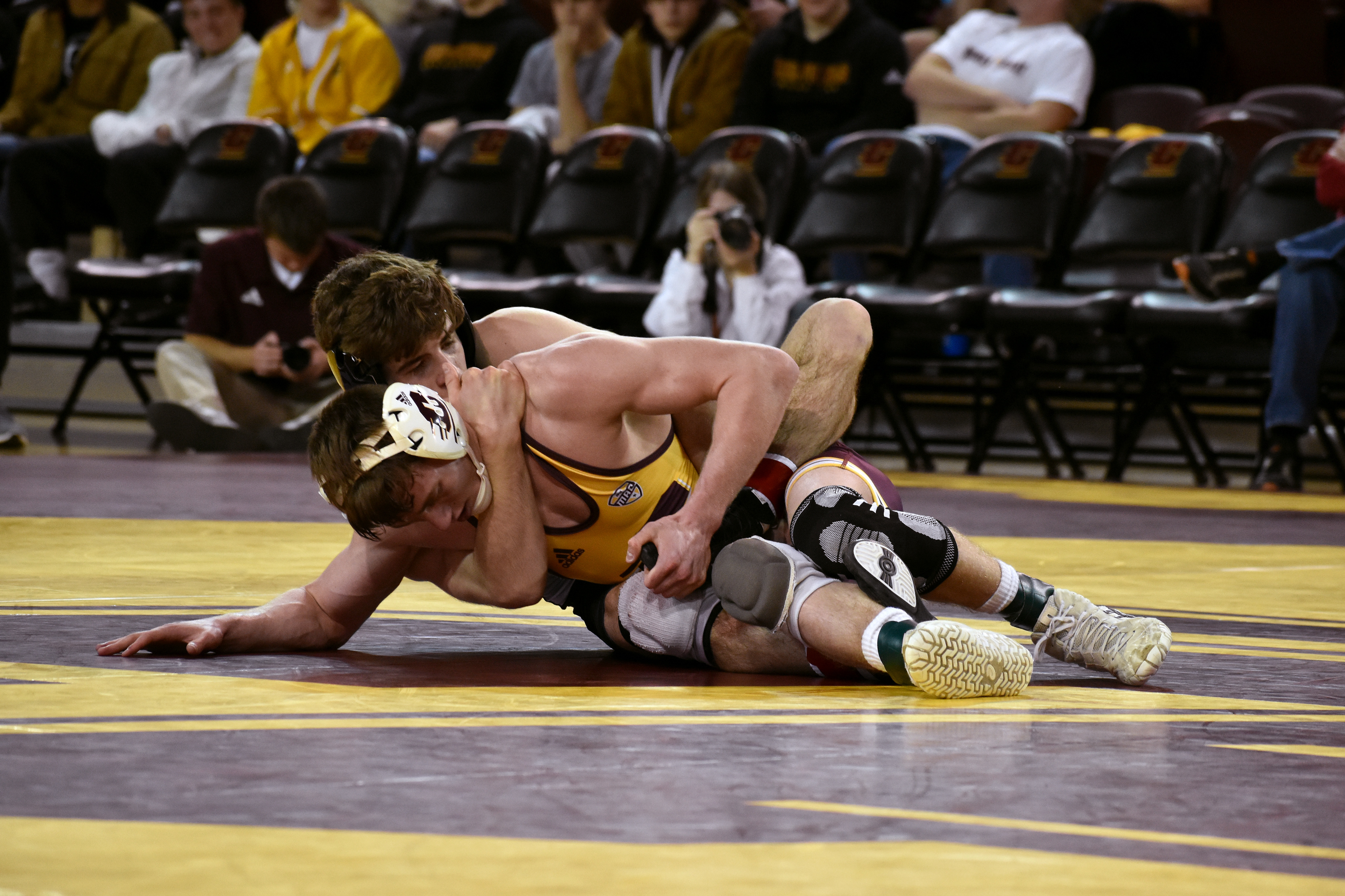 Lapeer junior Sean Spidle wrestles Blake West during a match against Northern Illinois University Friday, Jan. 13 in McGuirk Arena.