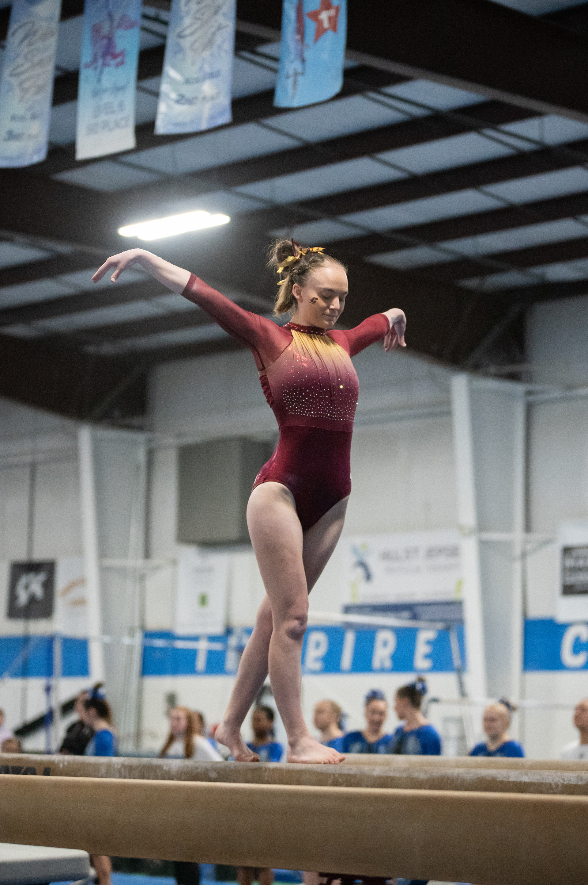 Reagan Sanborn performs on the balance beam during Grand Valley State University’s Health Heart Classic meet, Saturday, Feb. 24, at Kids Unlimited Activity Center, Jenison, Mich.