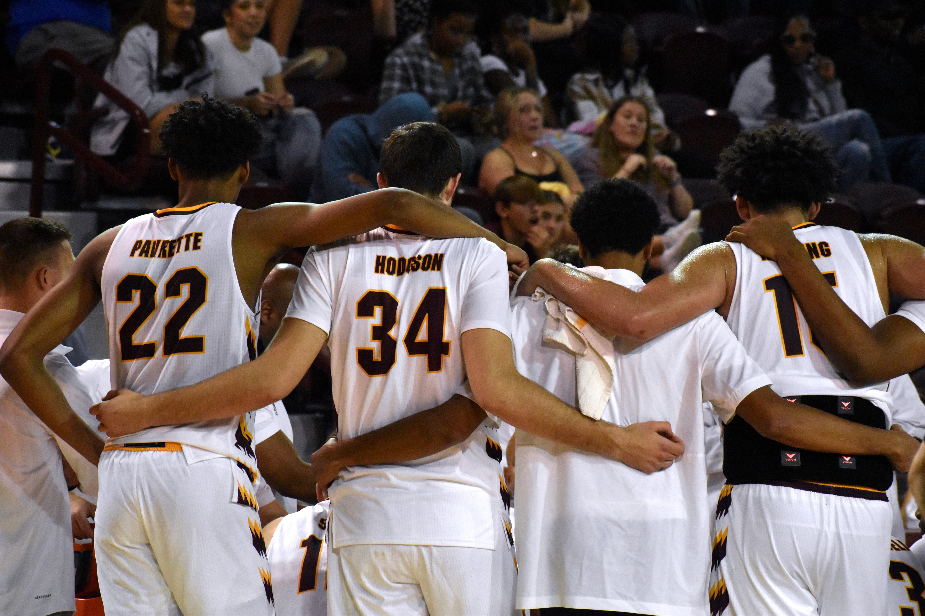 CMU's men's basketball team huddles for a timeout during CMU's exhibition game against Northwood Thursday, Nov. 3 in McGuirk Arena.