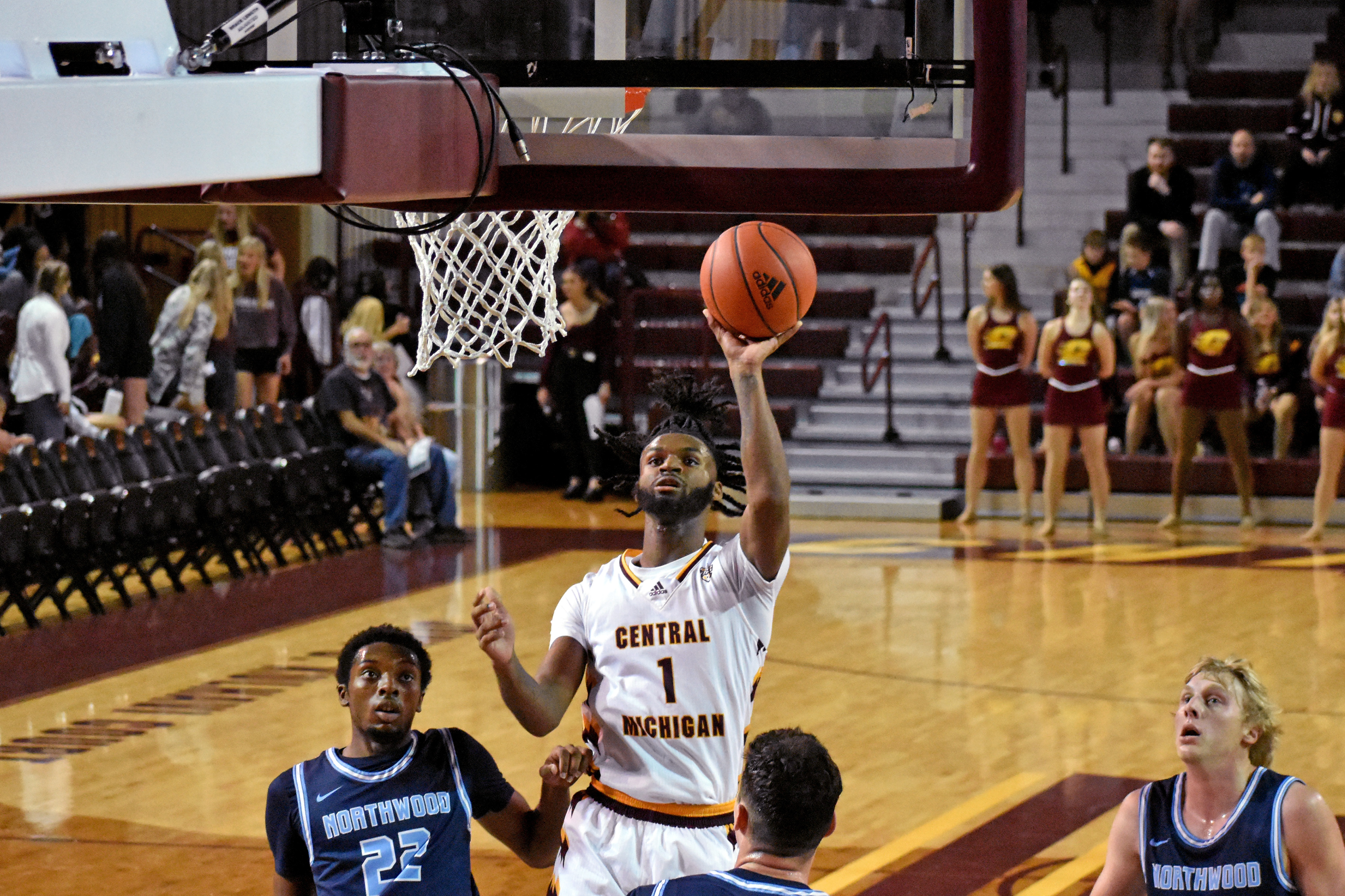 Freshman guard Reggie Bass shoots a layup during CMU's exhibition game against Northwood Thursday, Nov. 3 in McGuirk Arena.