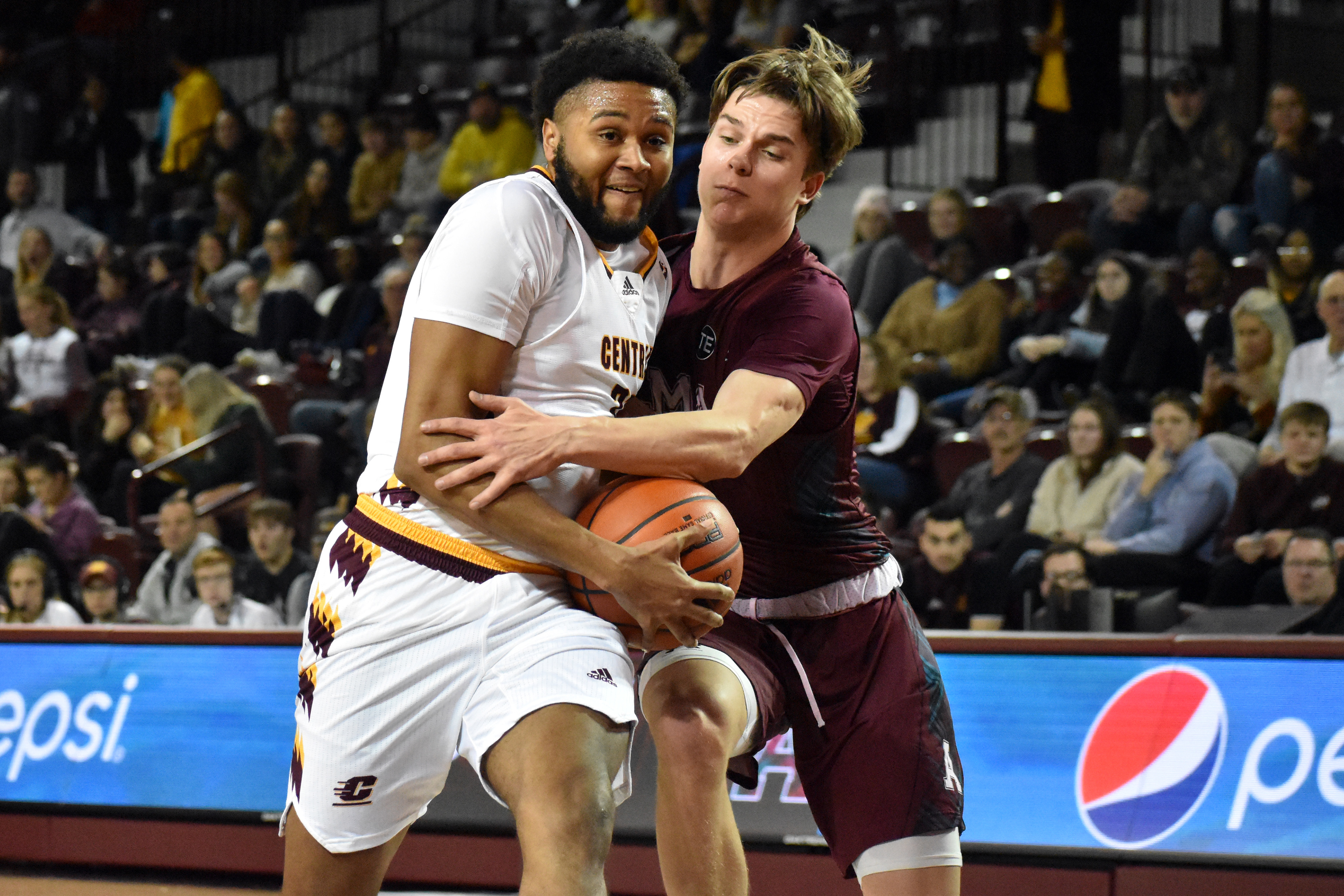 Senior guard Marc Garland II drives to the basket during a game against Alma on Saturday, Dec. 3 in in McGuirk Arena.