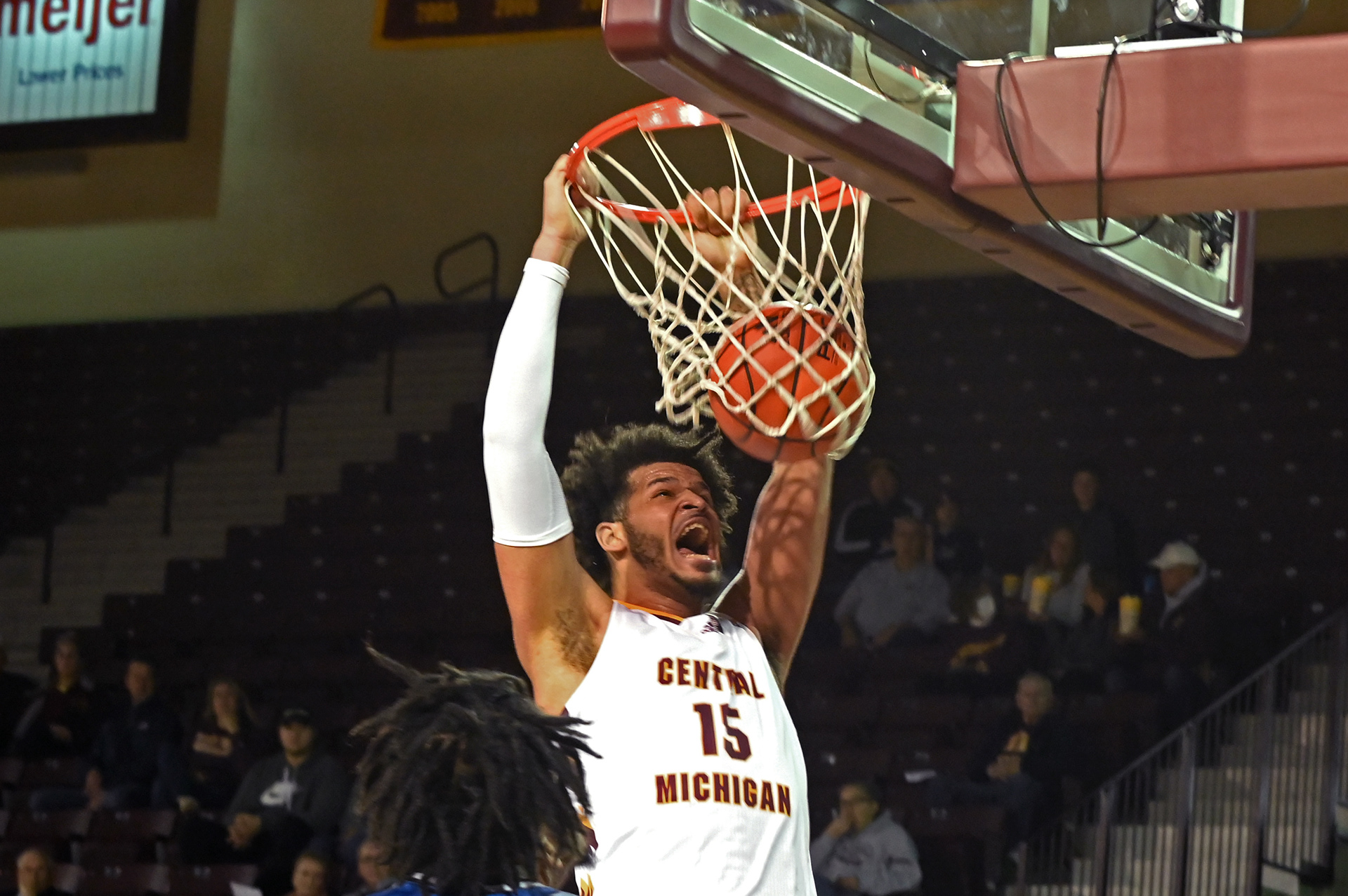 Sophomore center Markus Harding dunks the ball during a game against Eastern Illinois Sunday, Nov. 13 in McGuirk Arena.