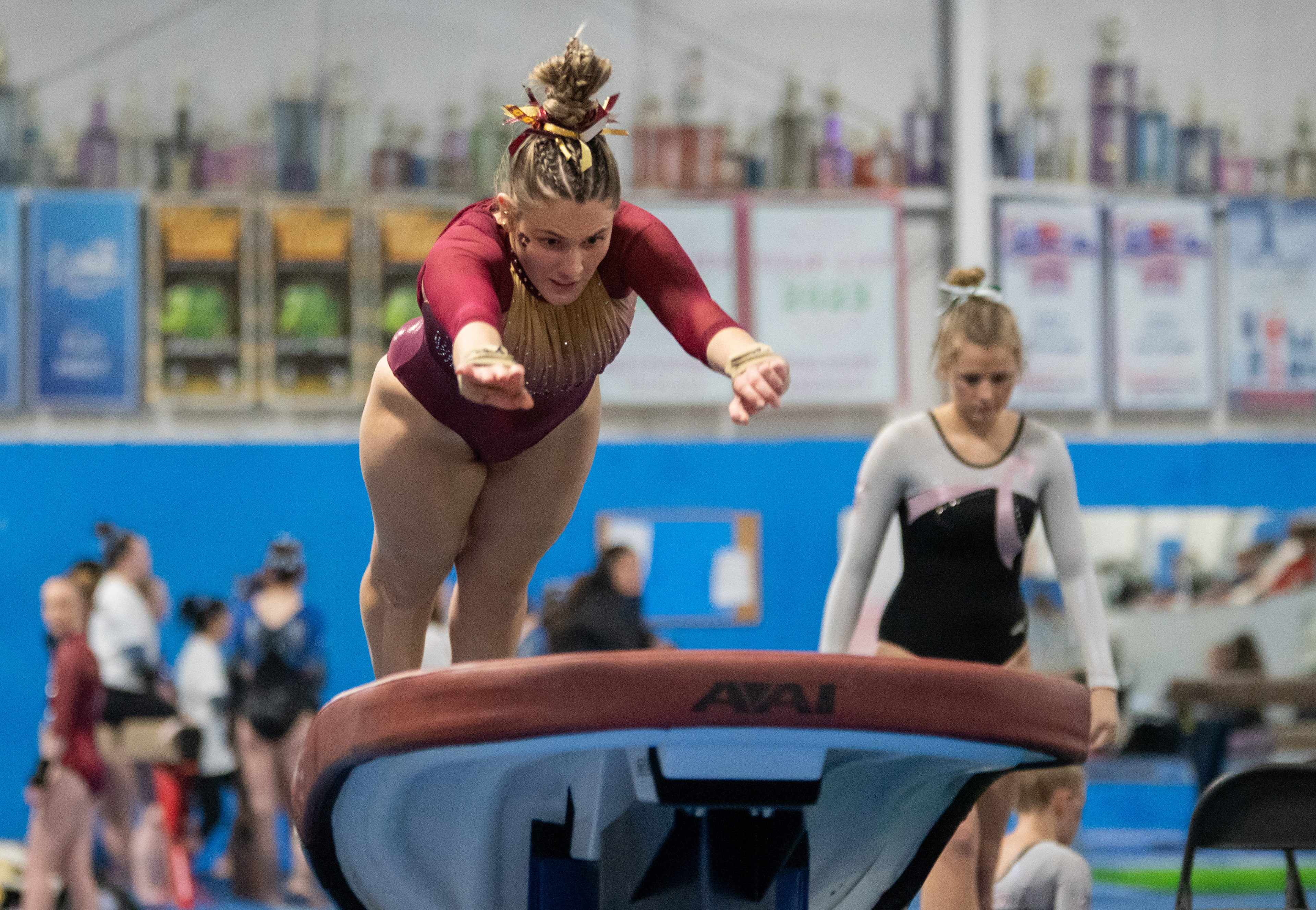 Alexa Cusimano warms up on the vault during Grand Valley State University’s Health Heart Classic meet, Saturday, Feb. 24, at Kids Unlimited Activity Center, Jenison, Mich.