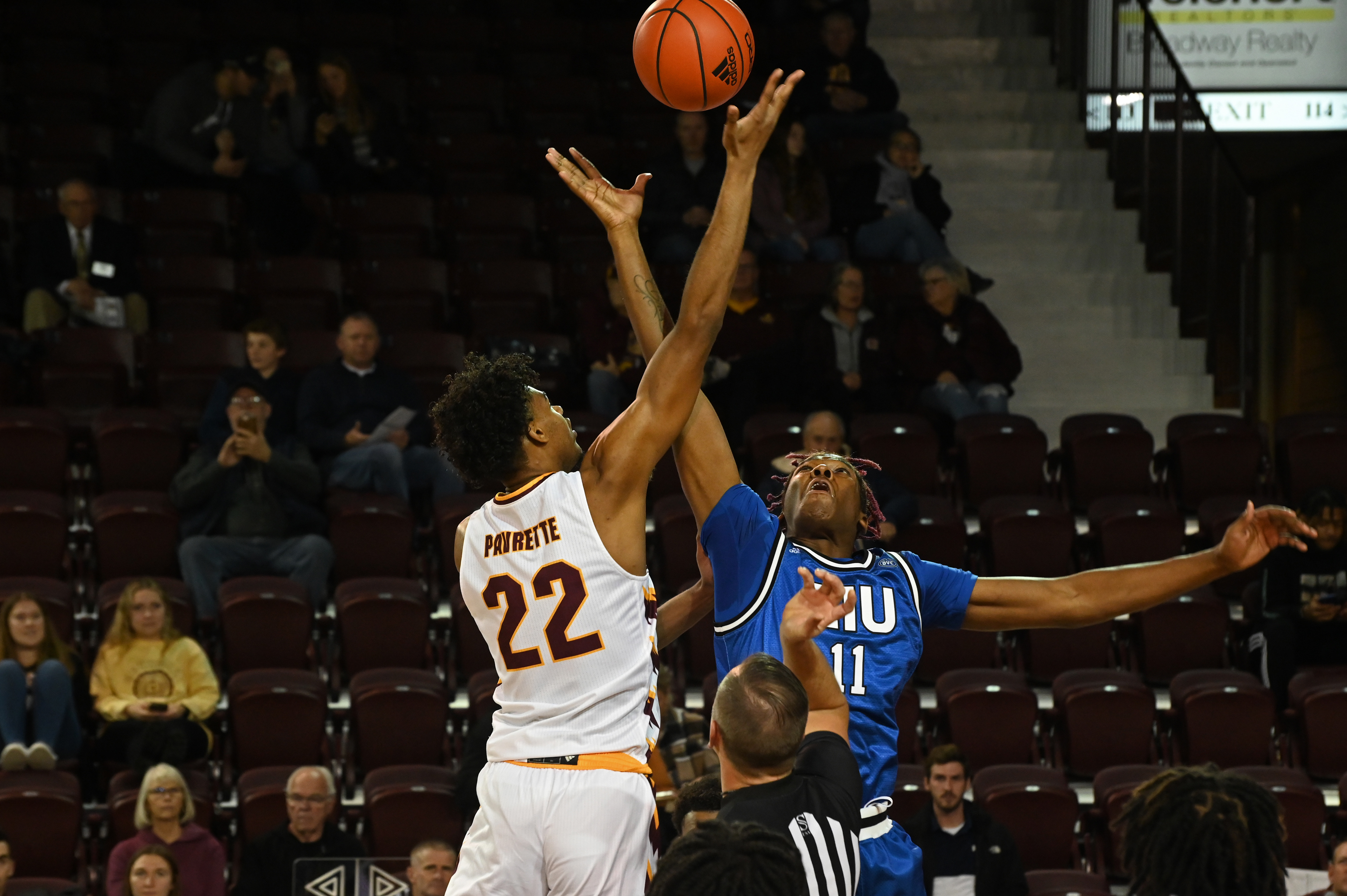 Sophomore center Nicolas Pavrette jumps at tipoff during a game against Eastern Illinois Sunday, Nov. 13 in McGuirk Arena.