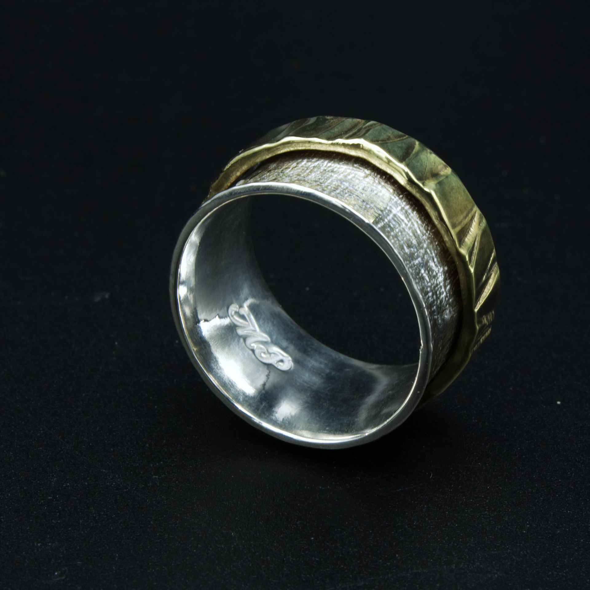Sterling silver and brass spinner ring