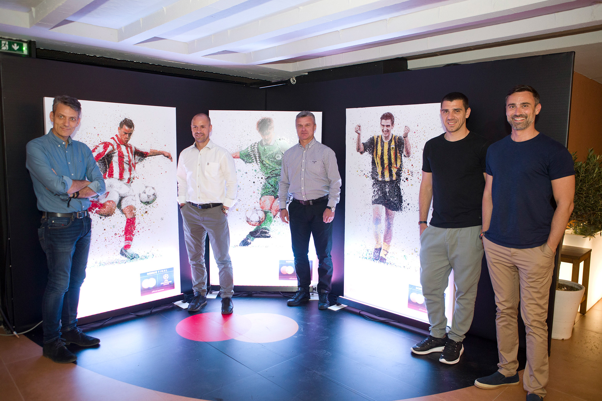 Celebration of Greek football through mosaic art, with footballers and their portraits