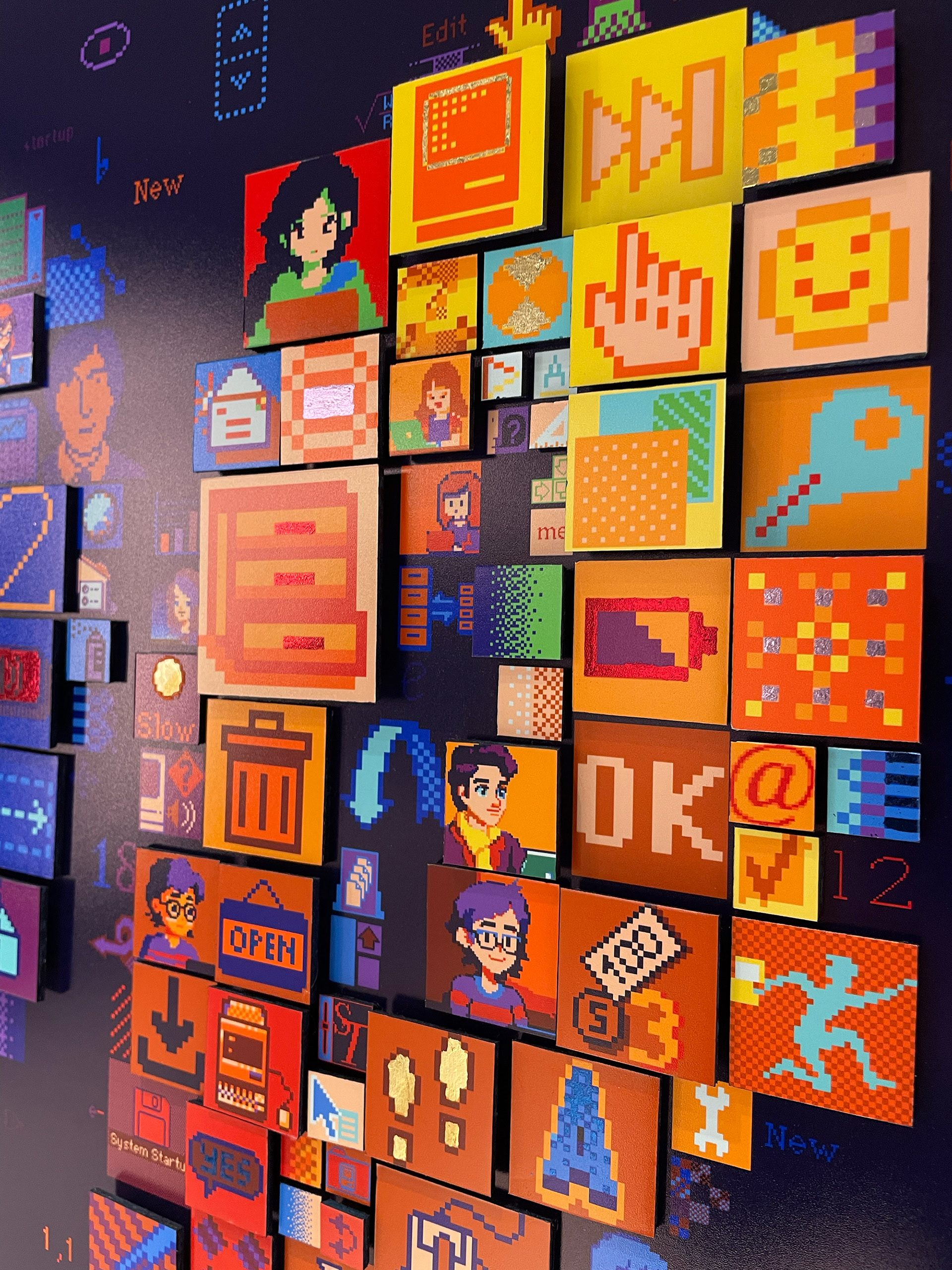 Detailed close-up of Charis Tsevis' digital mosaic "HELLO" artwork for Apple headquarters showing pixelated interface elements including Susan Kare's iconic designs, Macintosh interfaces, and modern digital symbols spanning four decades of Apple's history