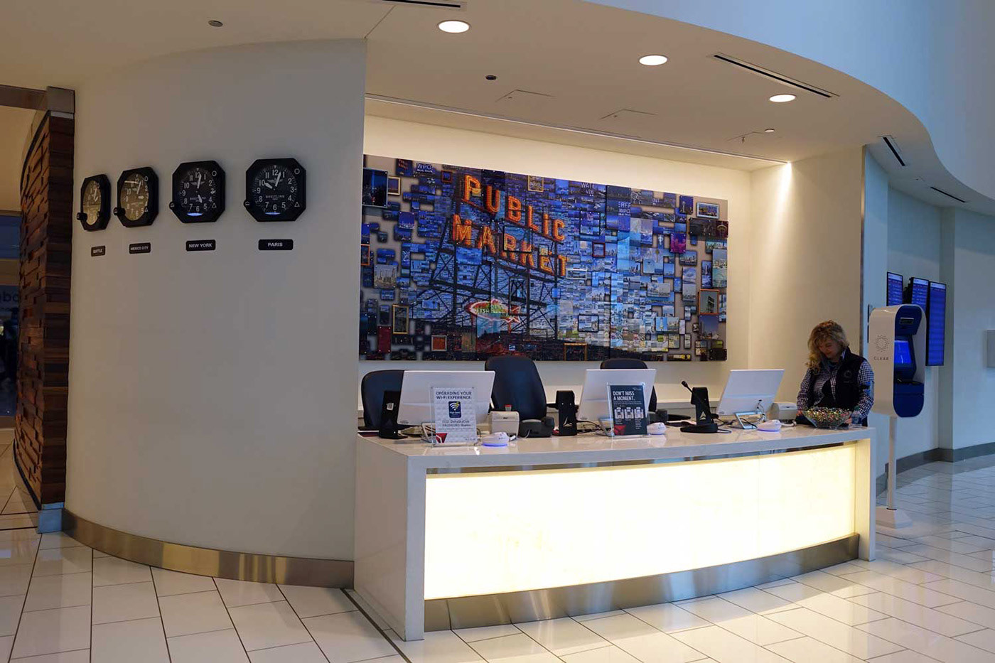Custom mosaic artwork installed in a modern lobby, airline mosaic art