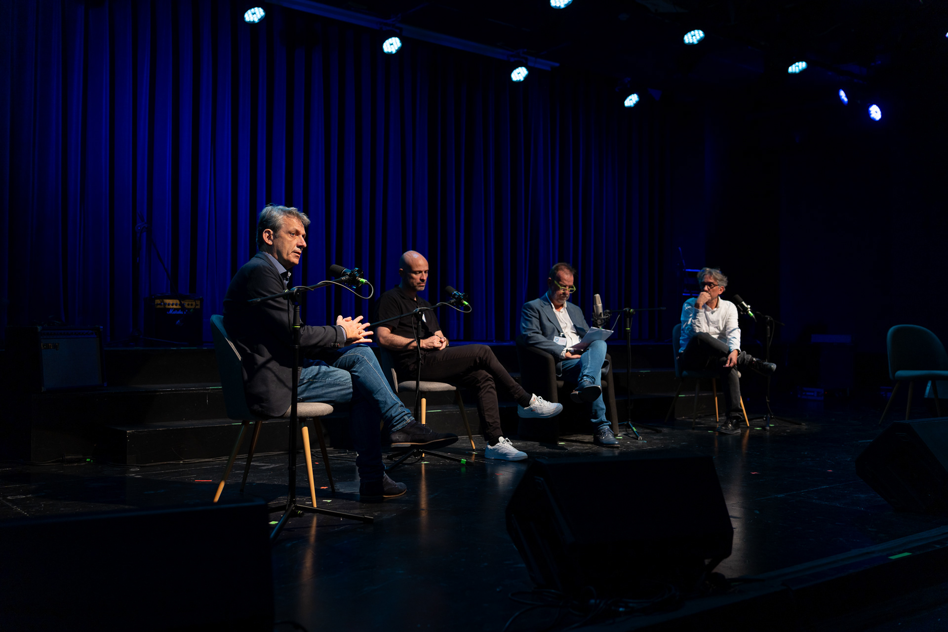 Panel discussion image featuring a graphic design professional in branding and advertising leaders at the EALL event in Athens.