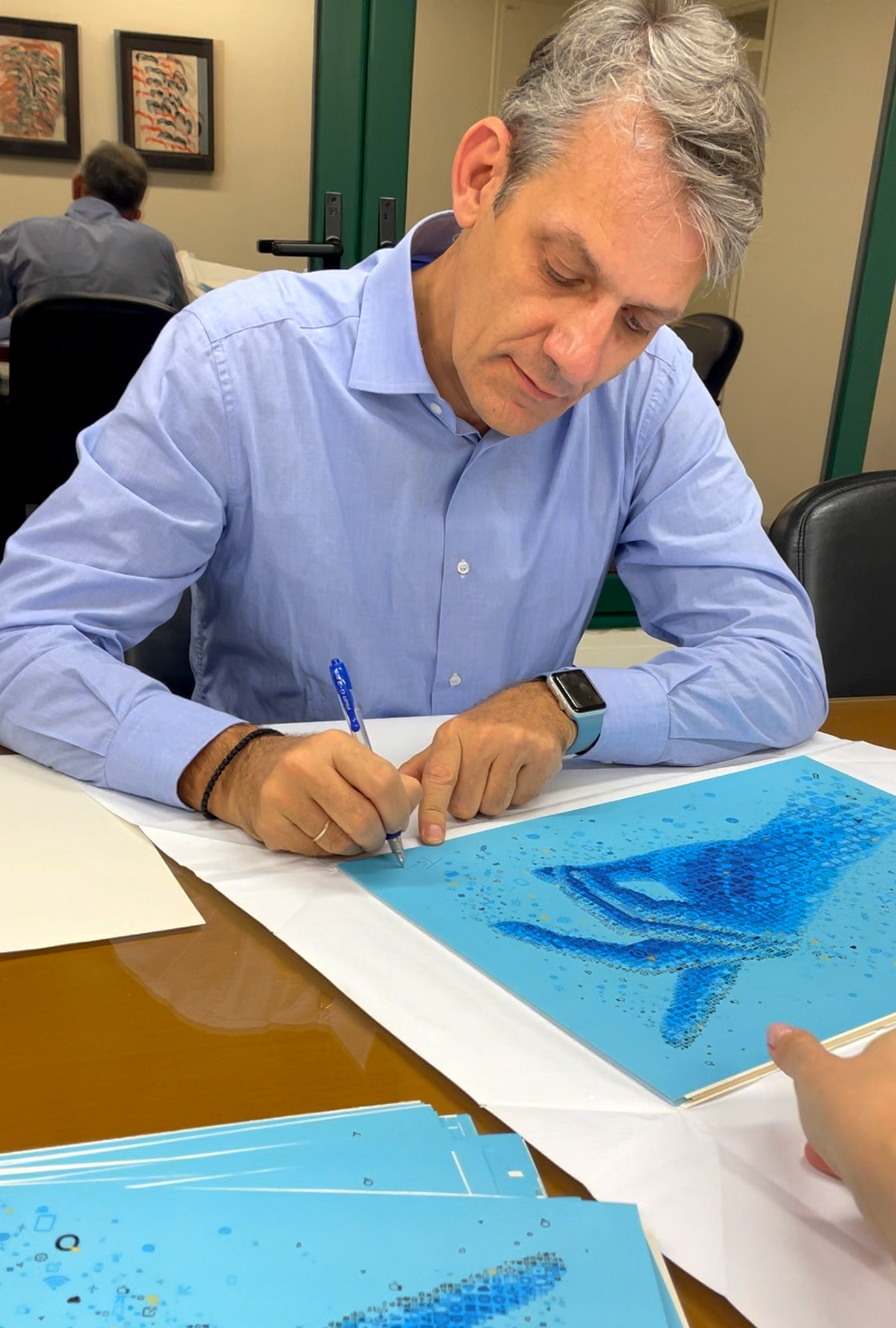 Artist signature on a custom corporate gift artwork