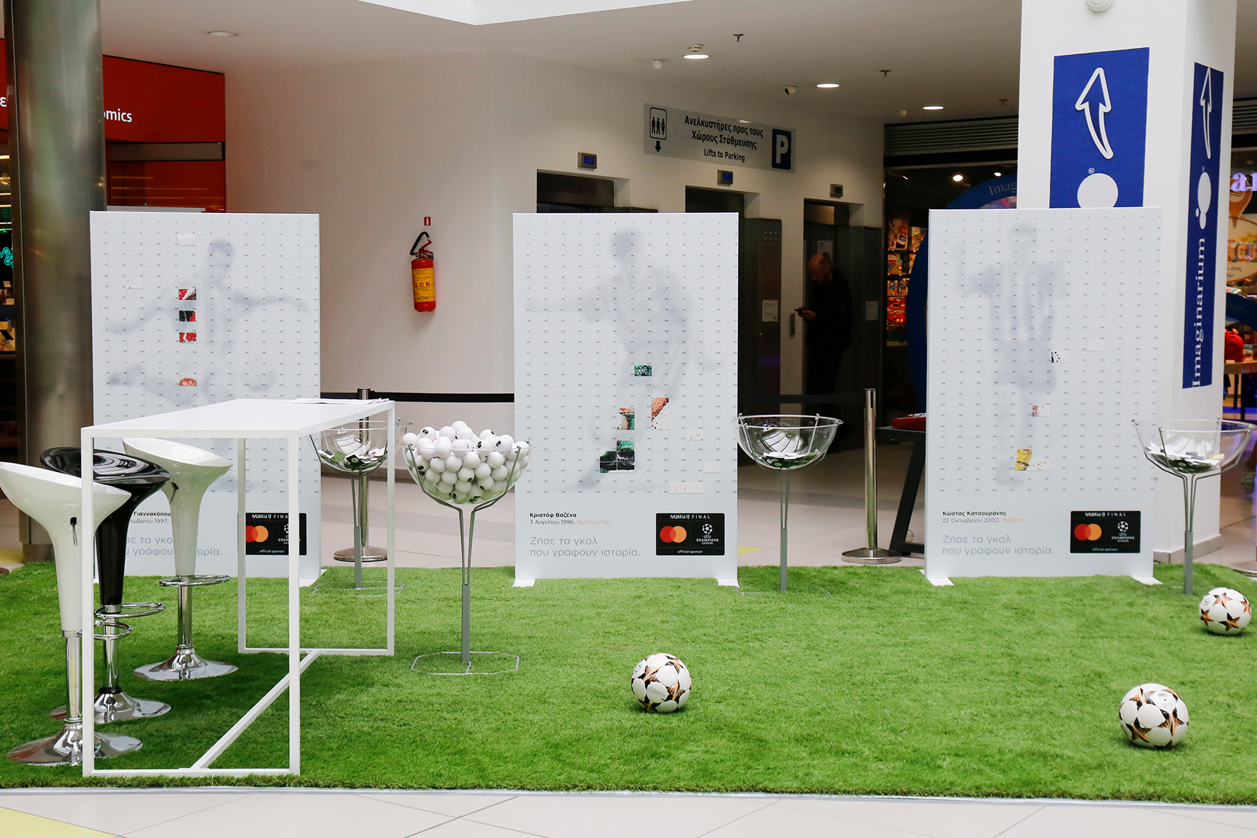 Interactive event illustrations in Athens showcasing historical Greek goals in UEFA for the Mastercard campaign