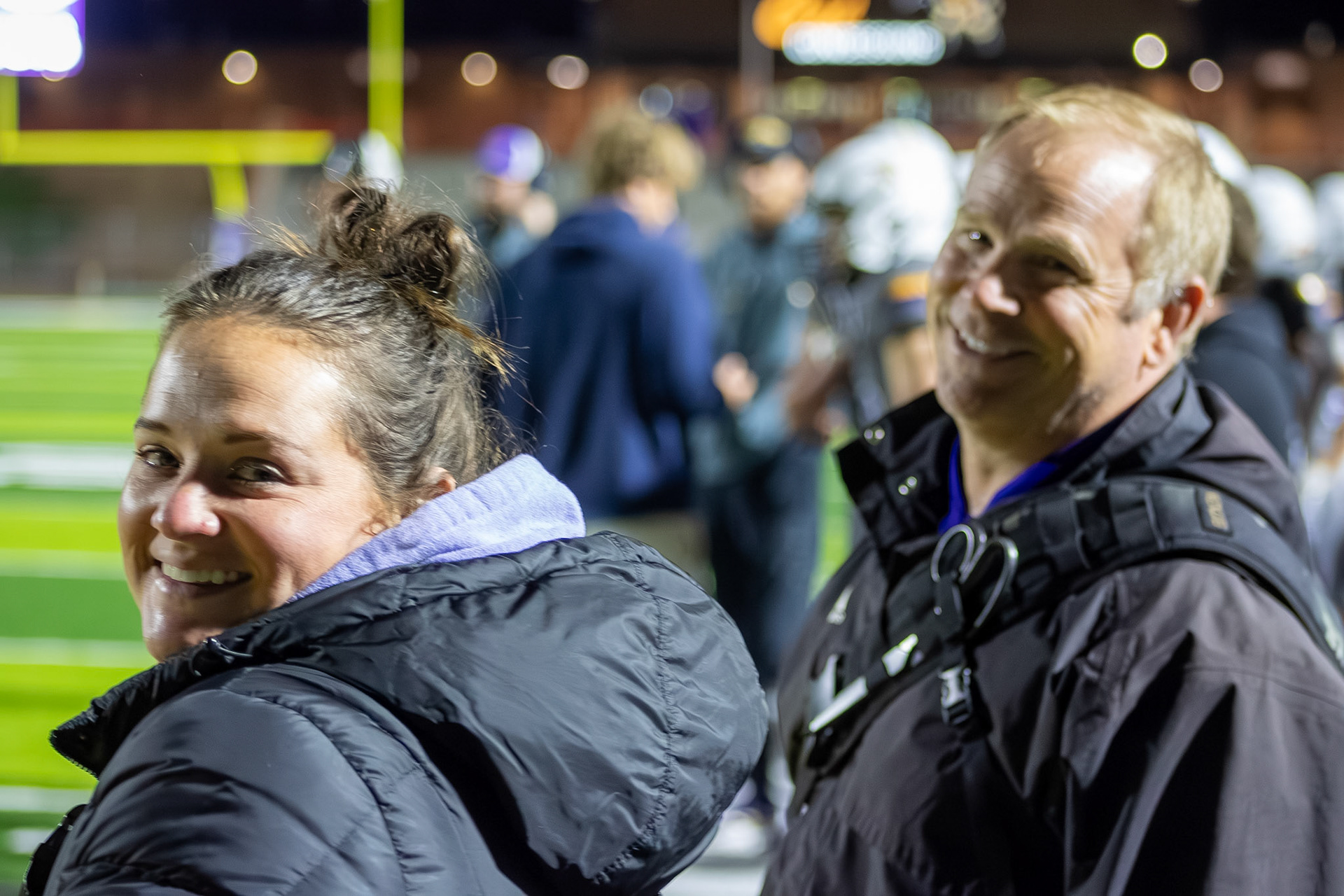 Athletic trainer's Ms. Kaycee and Mr. Knoop at a Jv football game alert and ready for whatever the game brings. (Photo by Khloe Lowande)