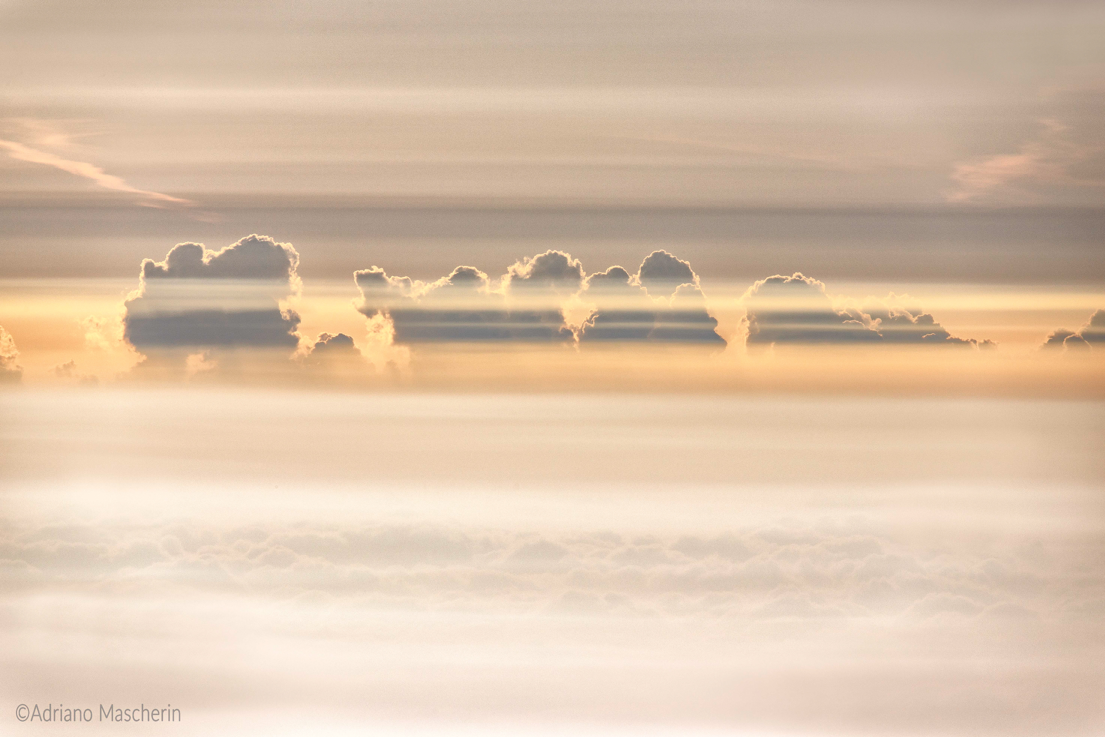 Cumuli sulla nebbia - Cumulus clouds on the fog