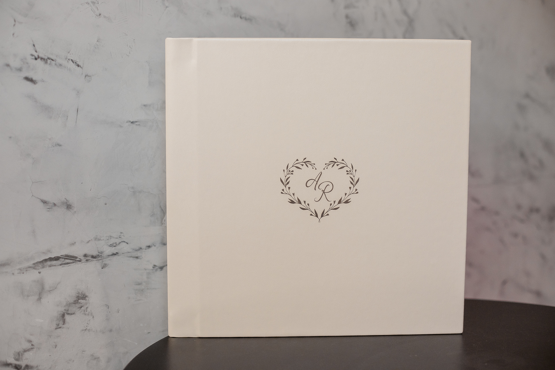 Álbum em corino com gravação a laser.