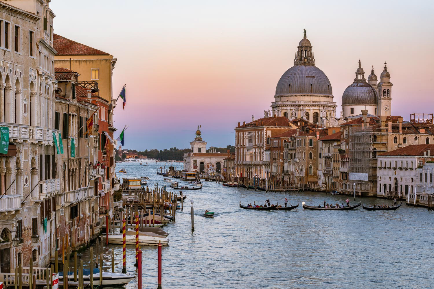 Sunset view of the iconic 17th-century Santa Maria di Salute Basilica on the Grand Canal in Venice