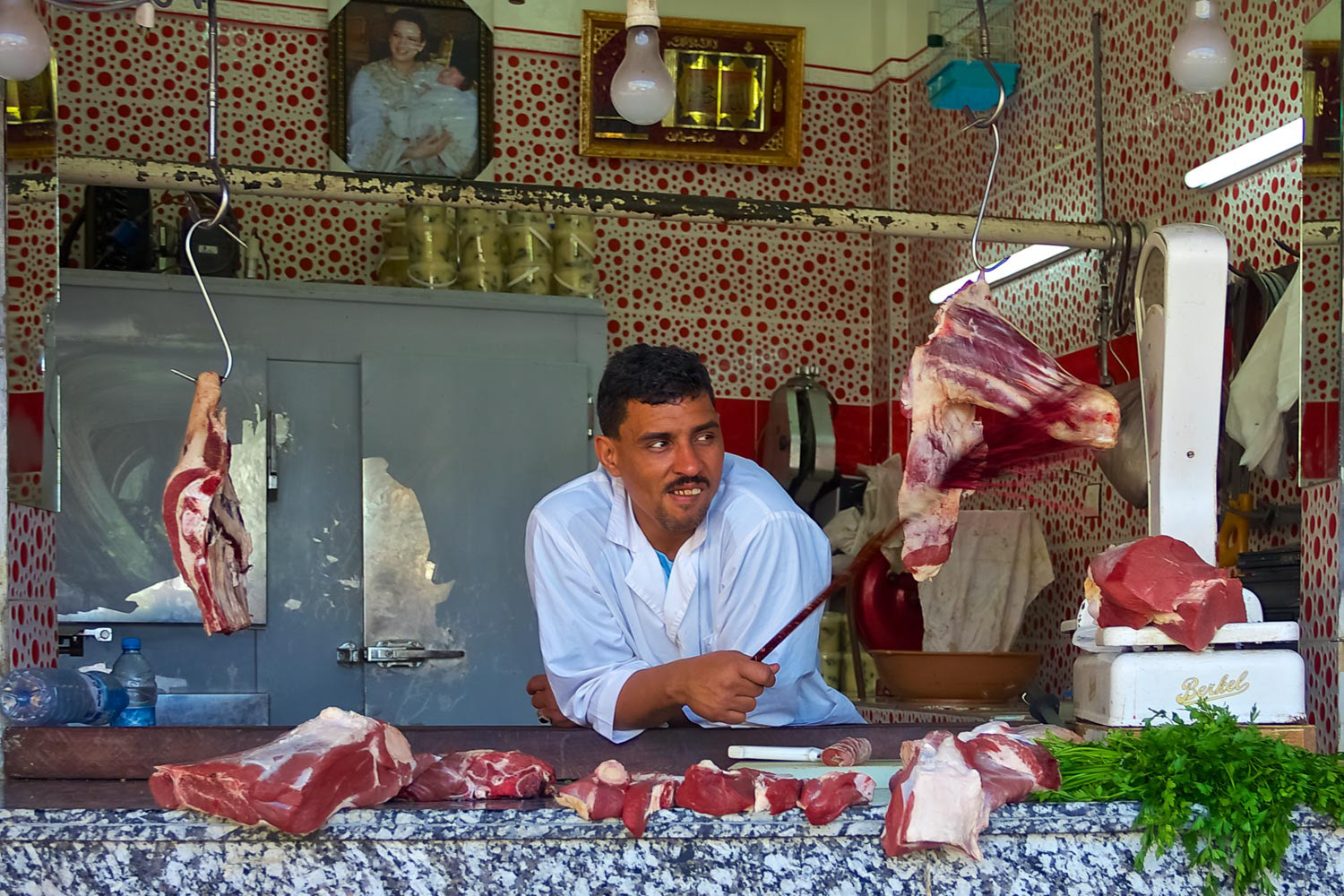 Butcher in an open air Moroccan market in Fez, Morocco
