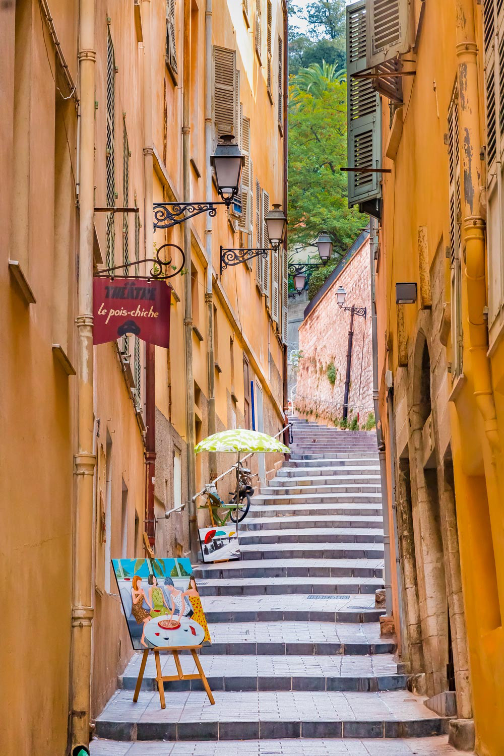 Narrow crooked street in the Old Town, Vieille Ville in Nice, French Riviera