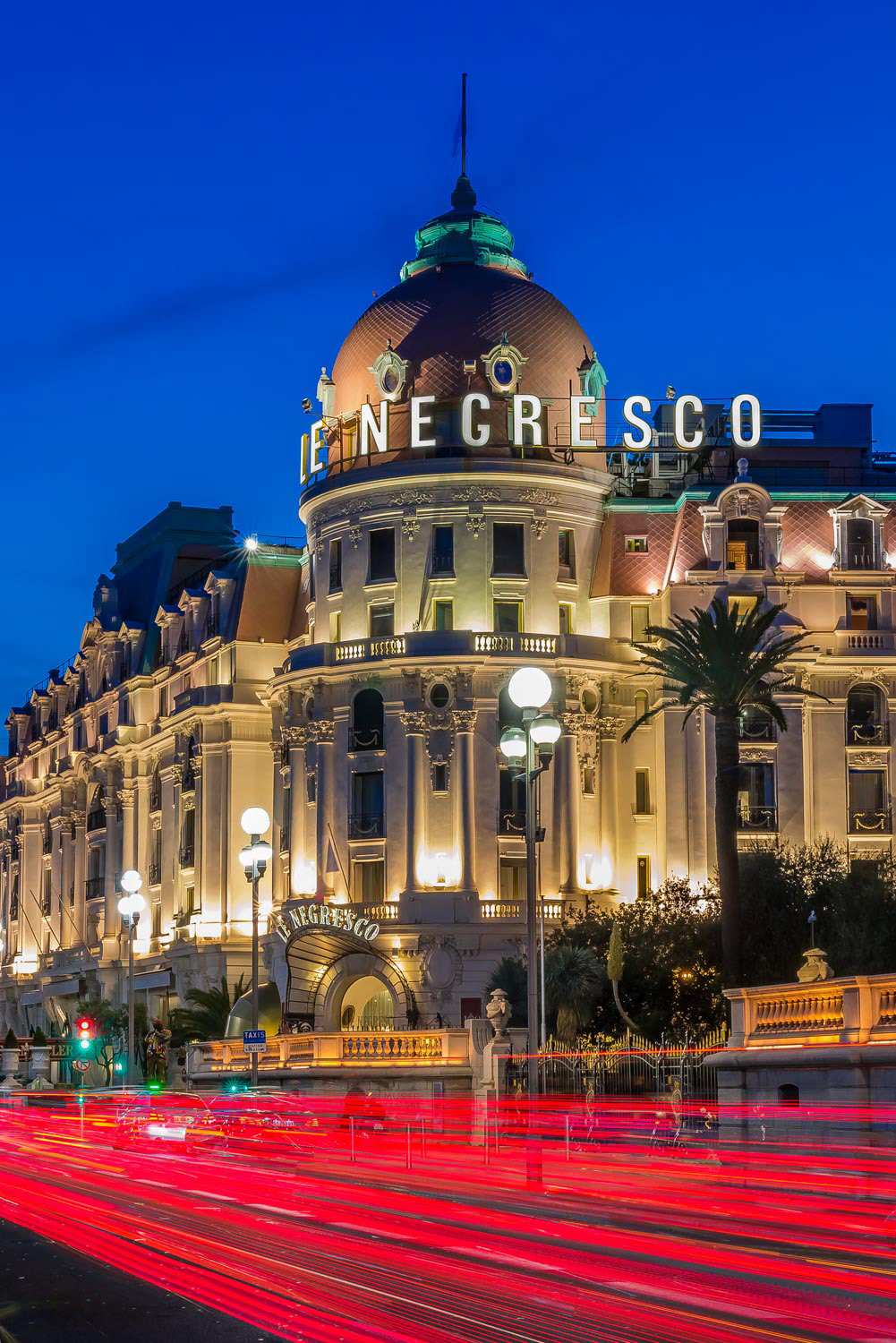 Hotel Negresco in Nice France at night with light trails
