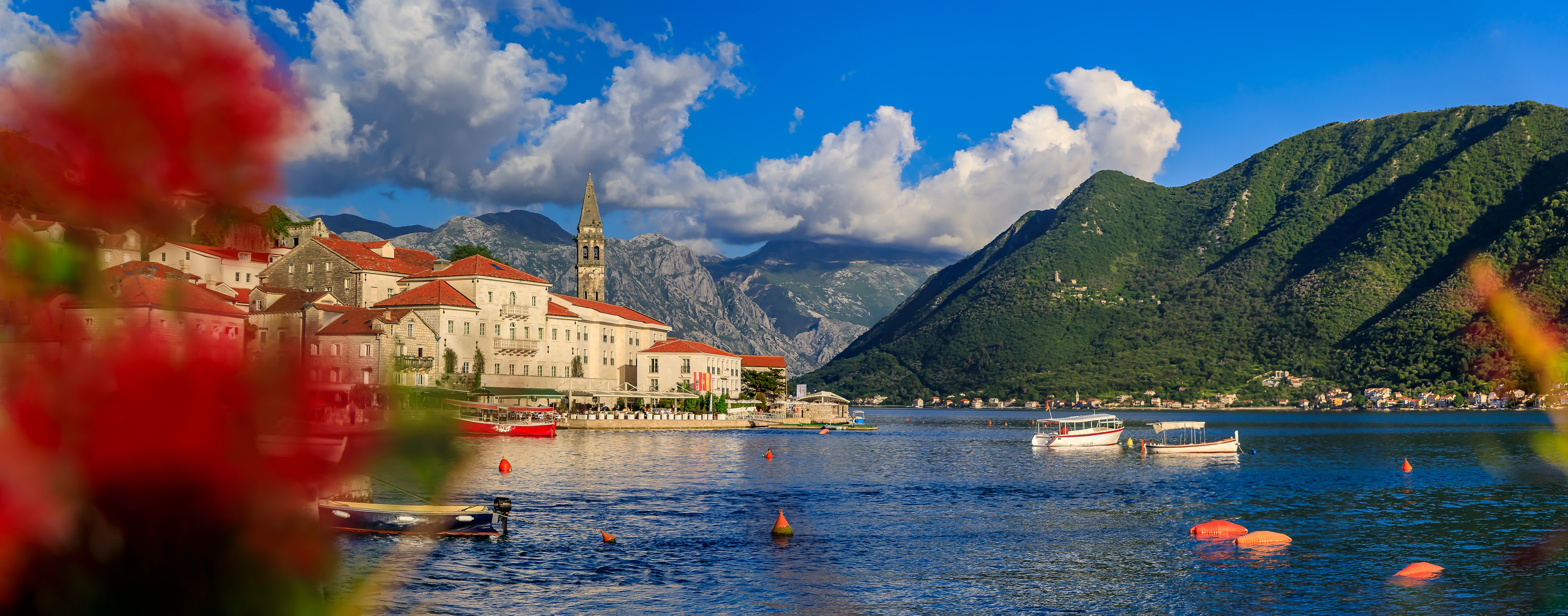 Scenic view of the postcard perfect historic town of Perast in the Bay of Kotor on a sunny day in the summer, Montenegro
