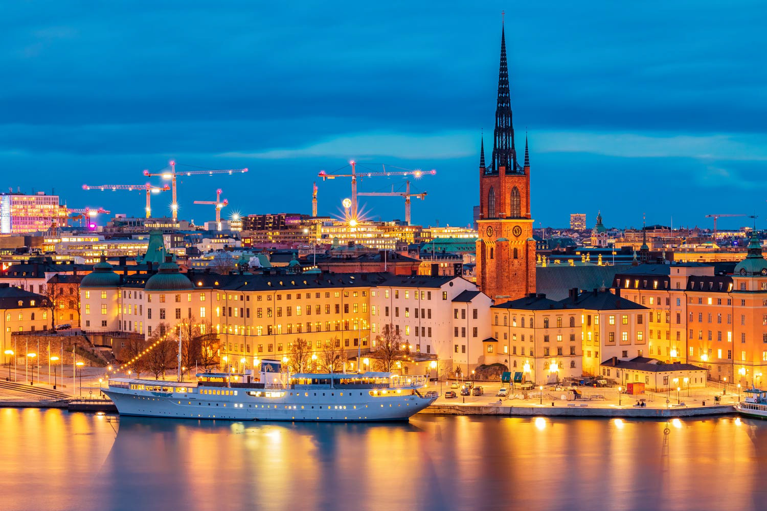 Sunset view onto Stockholm old town Gamla Stan and Riddarholmen church in Sweden