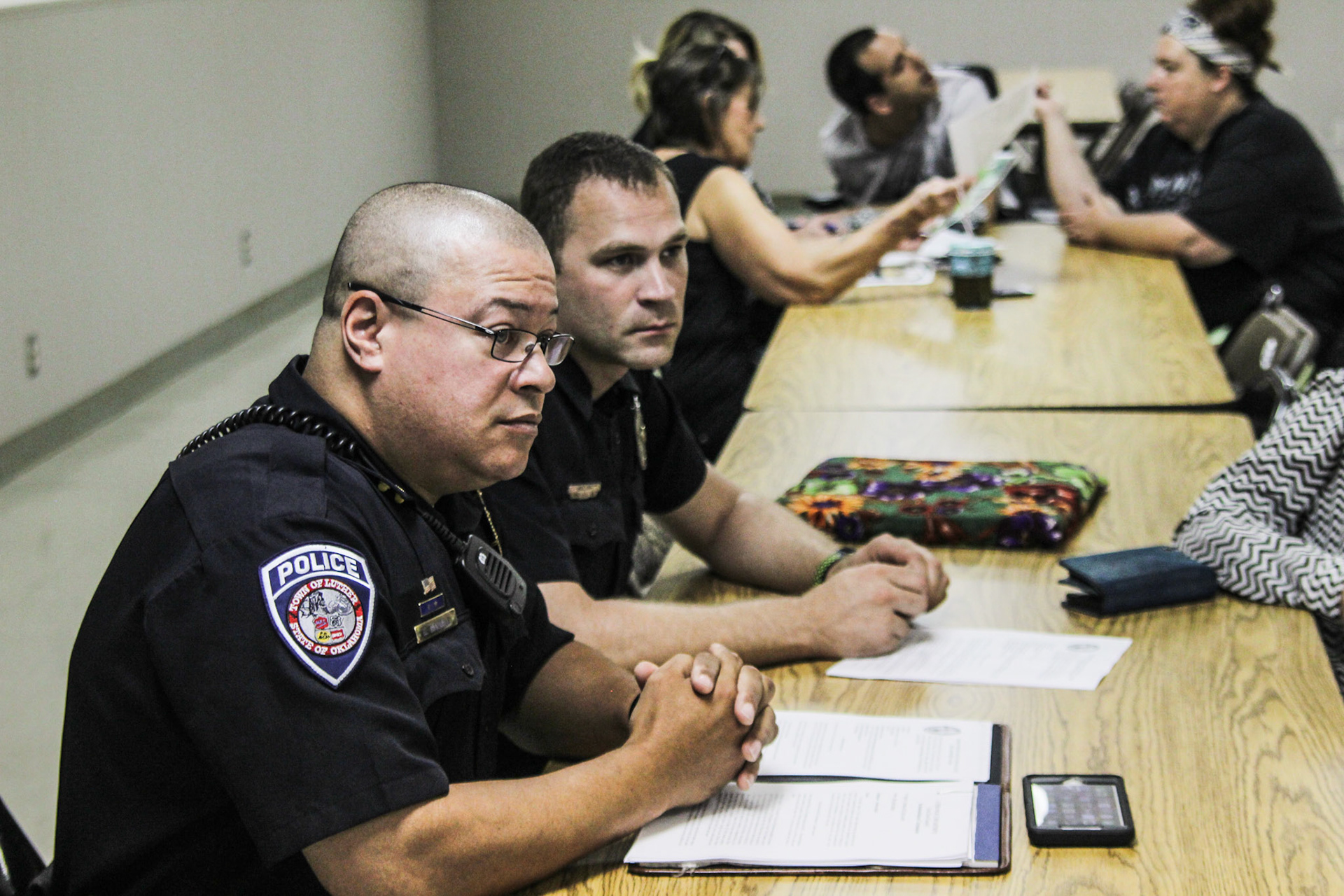 Luther Police Chief David Randall (left) and sergeant Tony Walker (right) attend the town board meeting when former chief Anthony Butler resigns amid complaints of domestic abuse and assault of a police officer. Walker is the complainant of the latter charge. (Luther Register News)