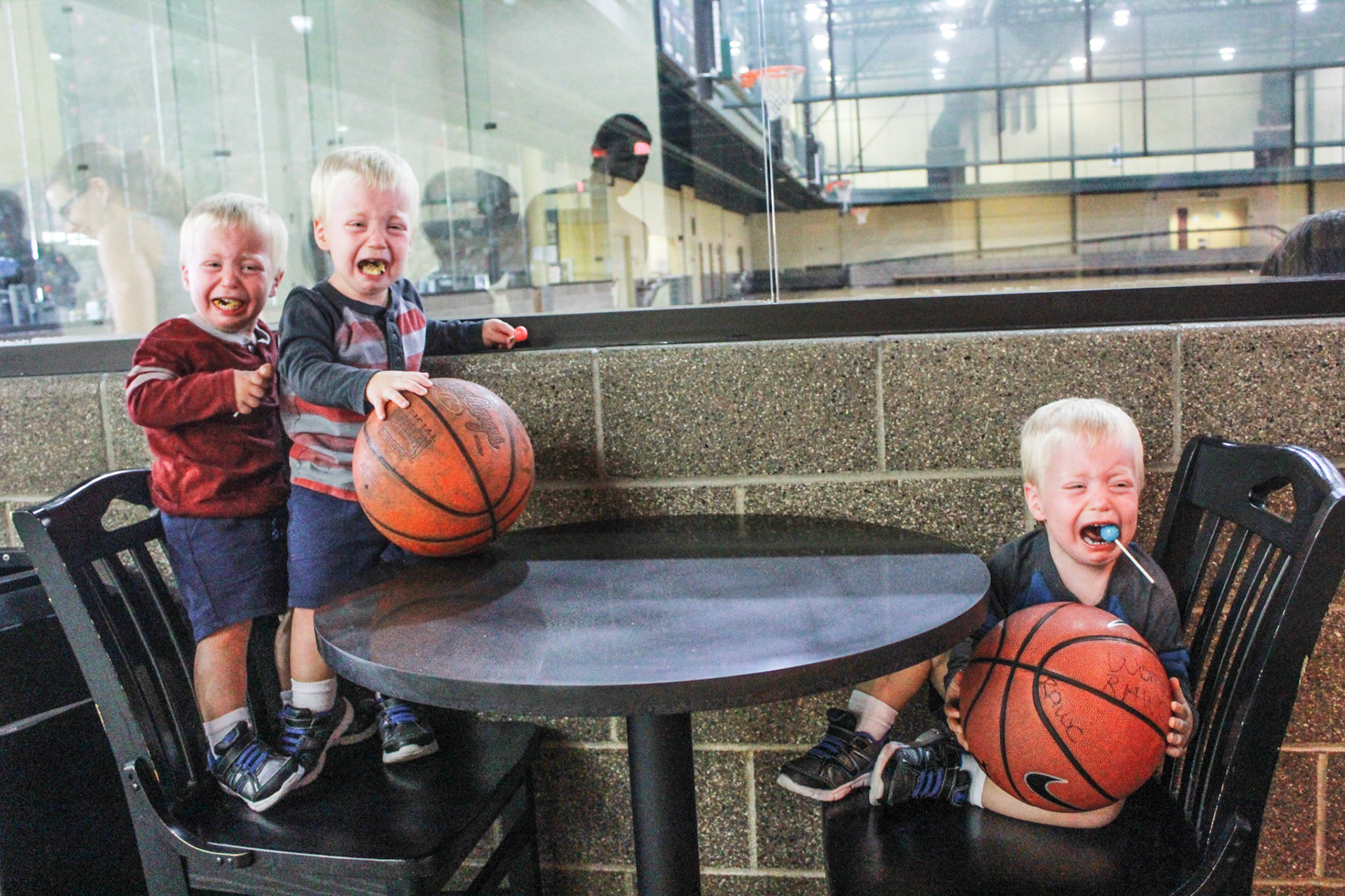 Professor Jonathan Callis' triplets do everything together, even cry. (The Bison)