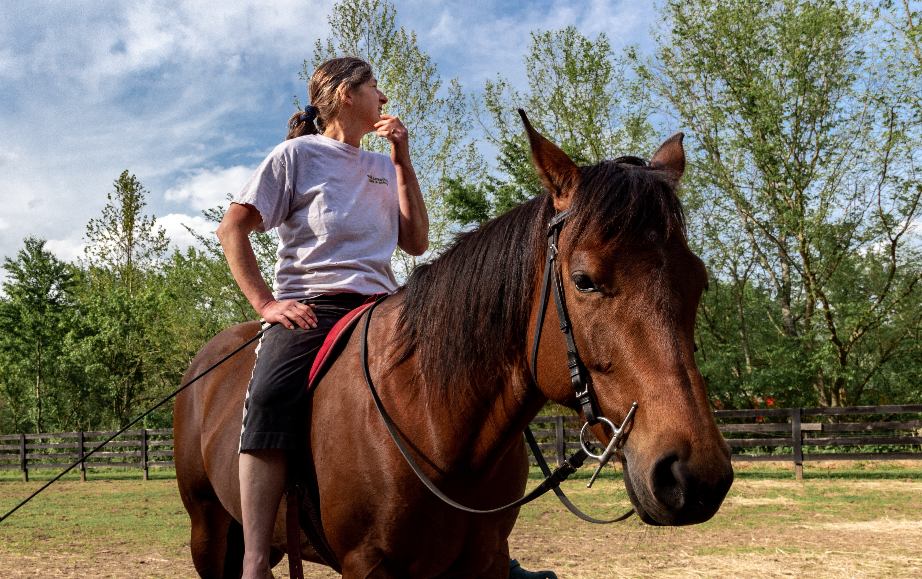 Candid of a friend on a horse, giving a lesson