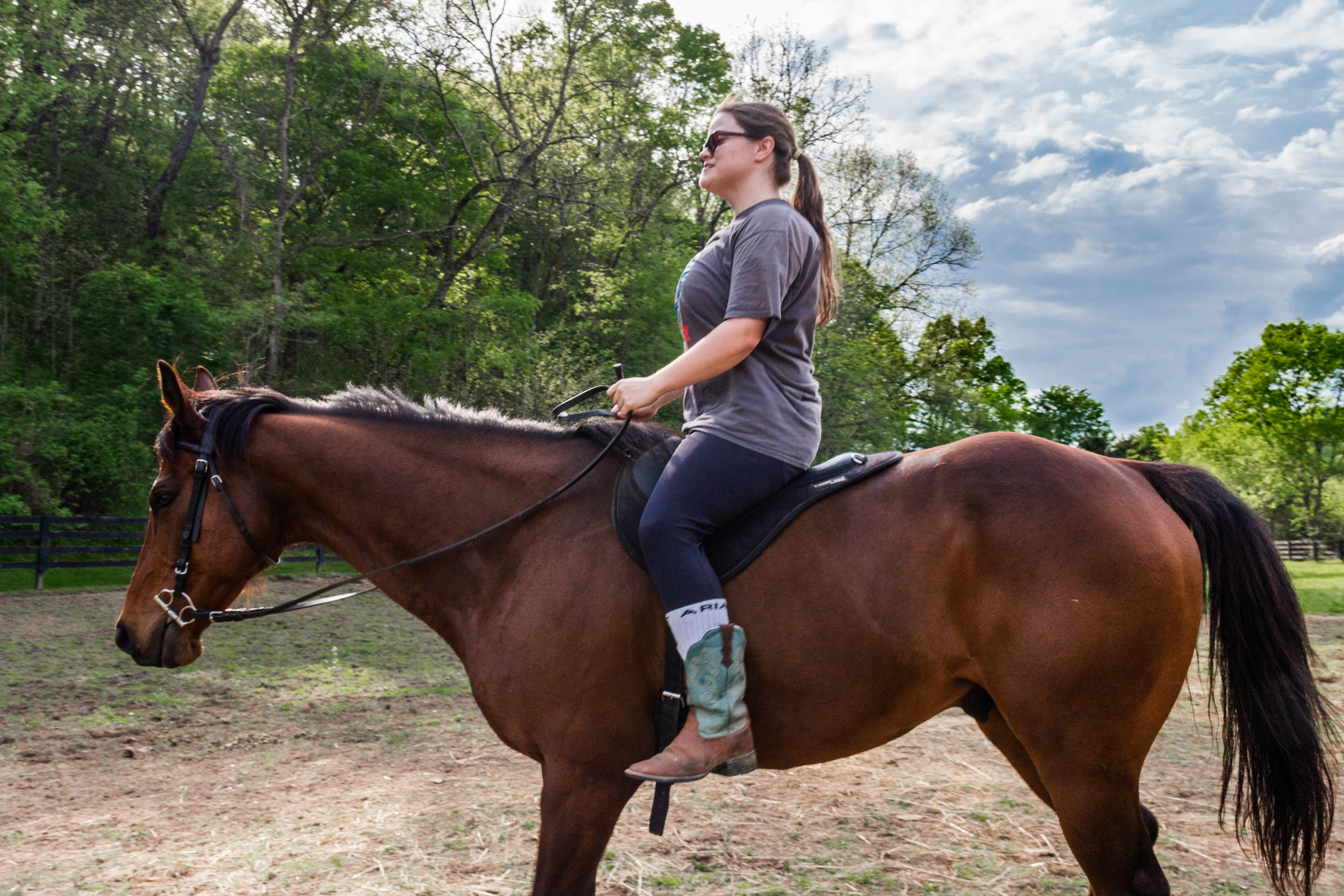 Candid - riding a horse